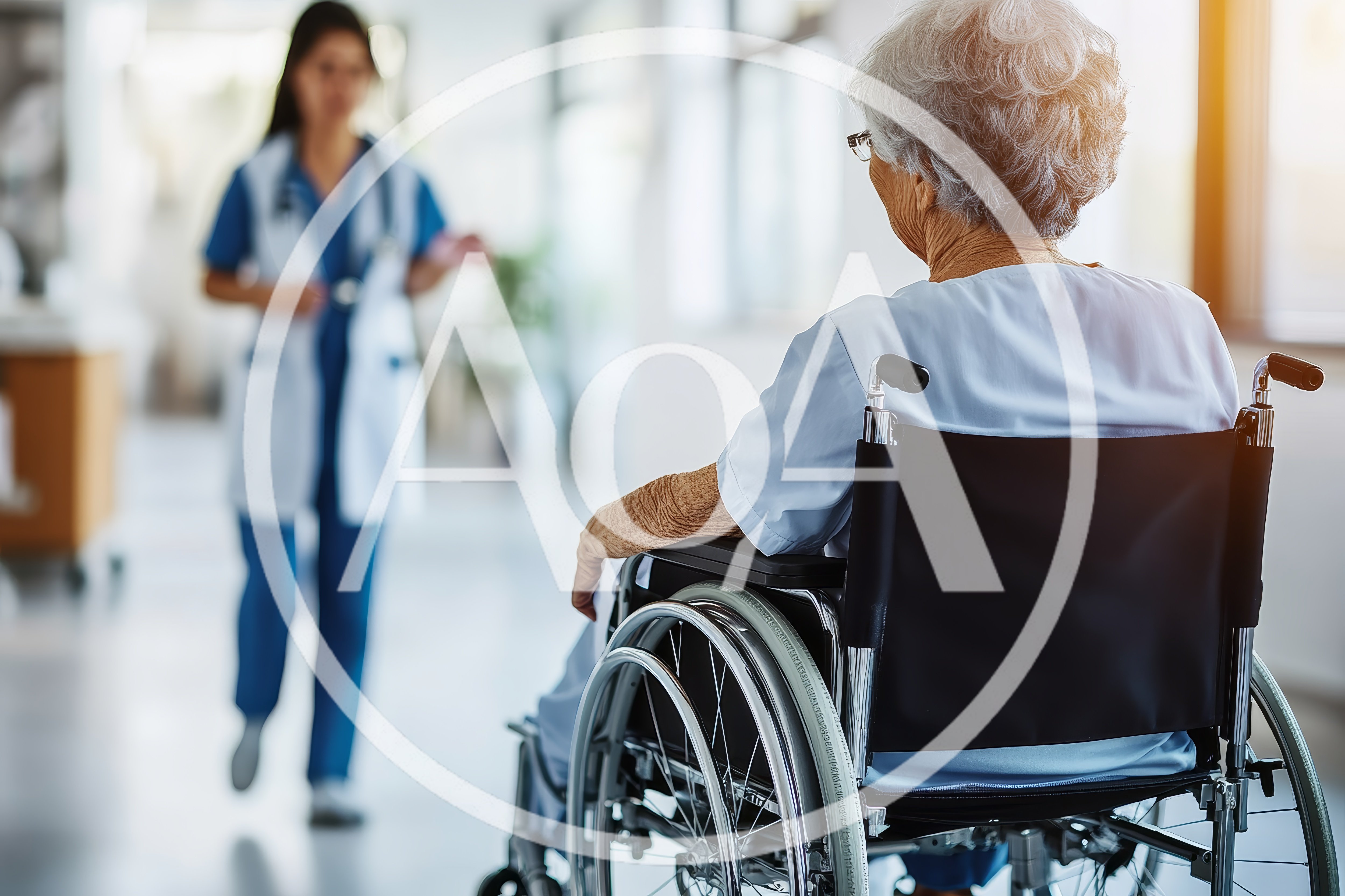 Elderly Patient Sitting In Wheelchair In Hospital Corridor