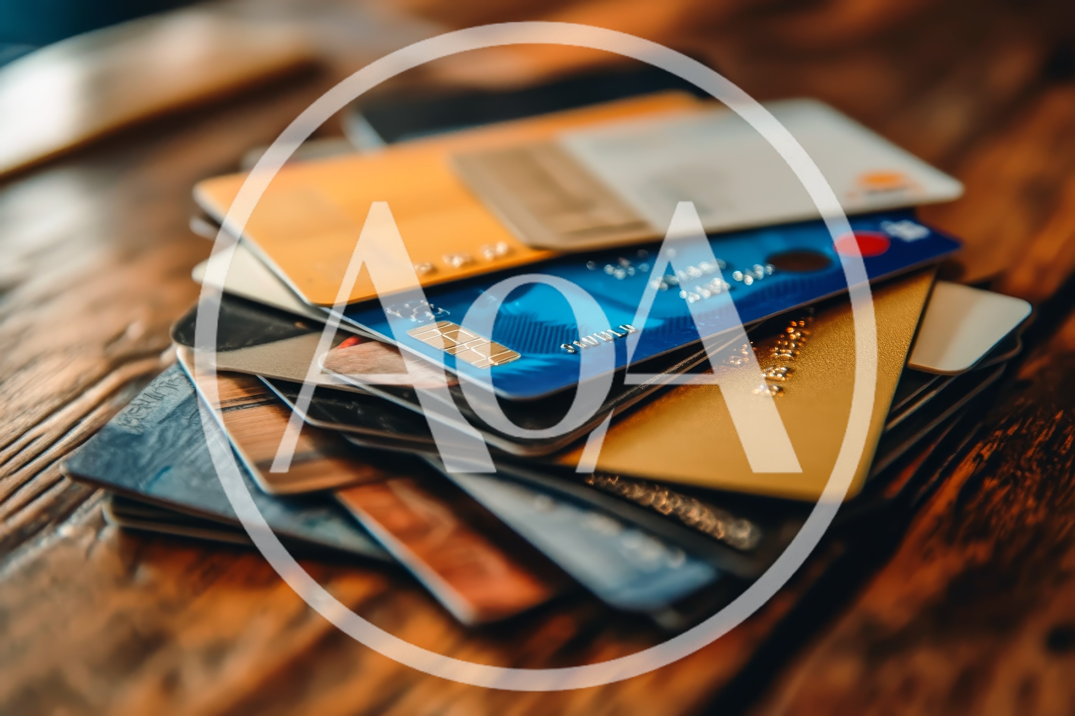 Stack of Various Credit Cards on Wooden Table