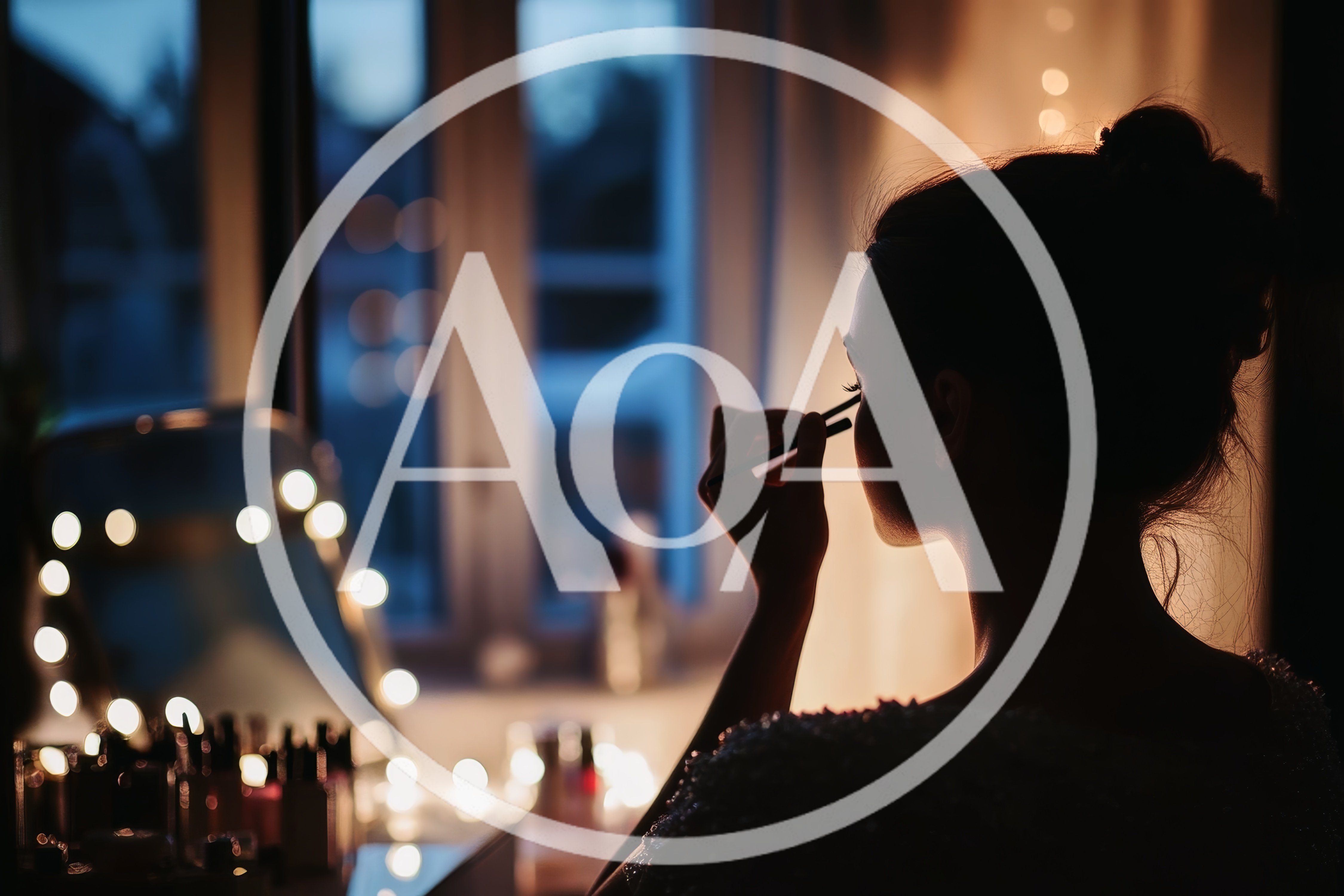 Silhouette of Woman Applying Makeup at Vanity Mirror