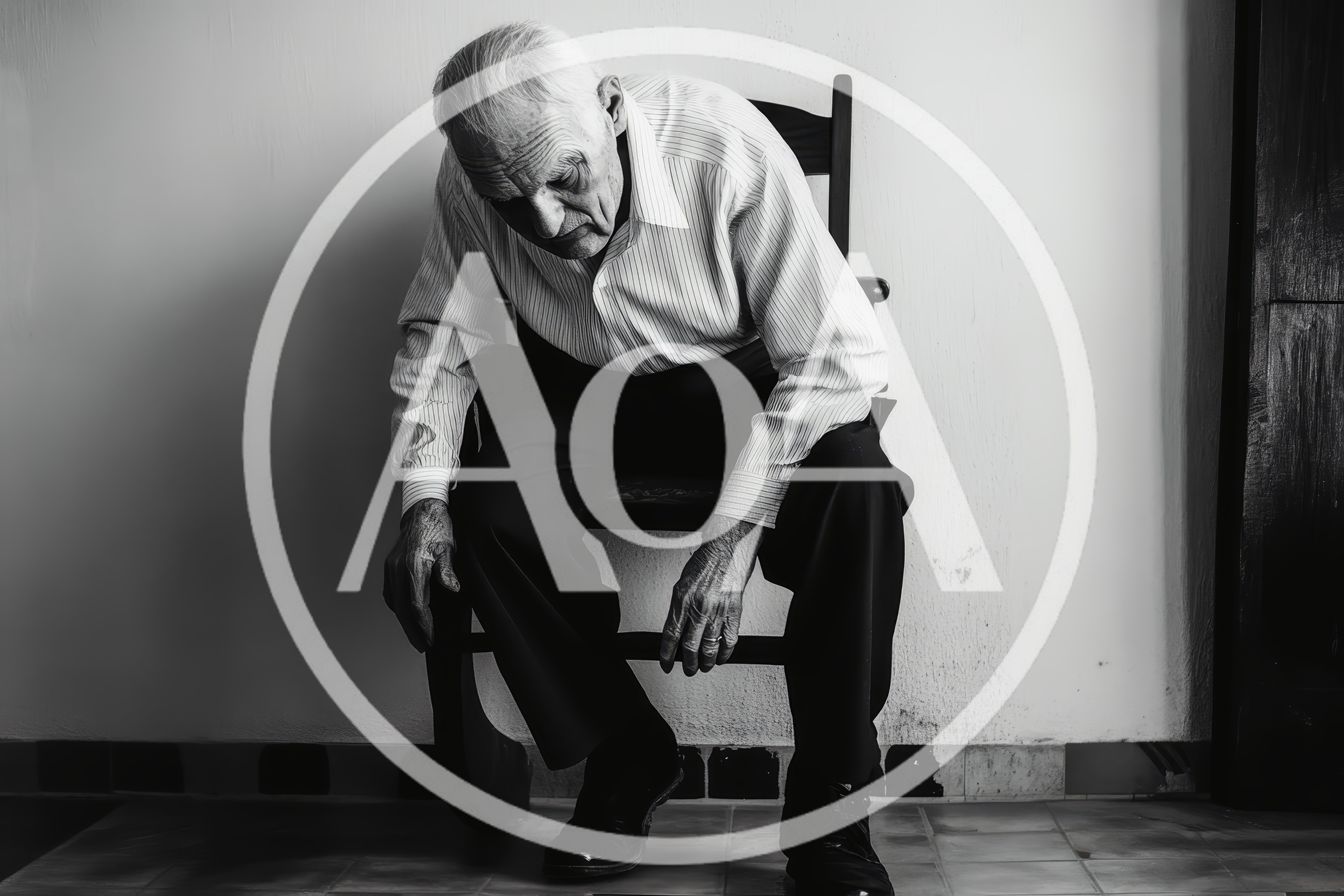 Elderly Man Sitting Alone In A Chair