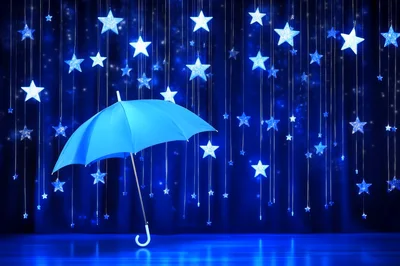 Blue Umbrella Standing Under Hanging Decorative Stars