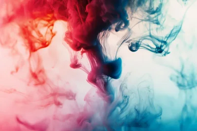 Red and Blue Ink Swirling in Water