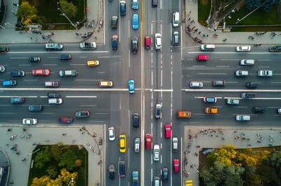Aerial View Of Busy City Intersection With Traffic