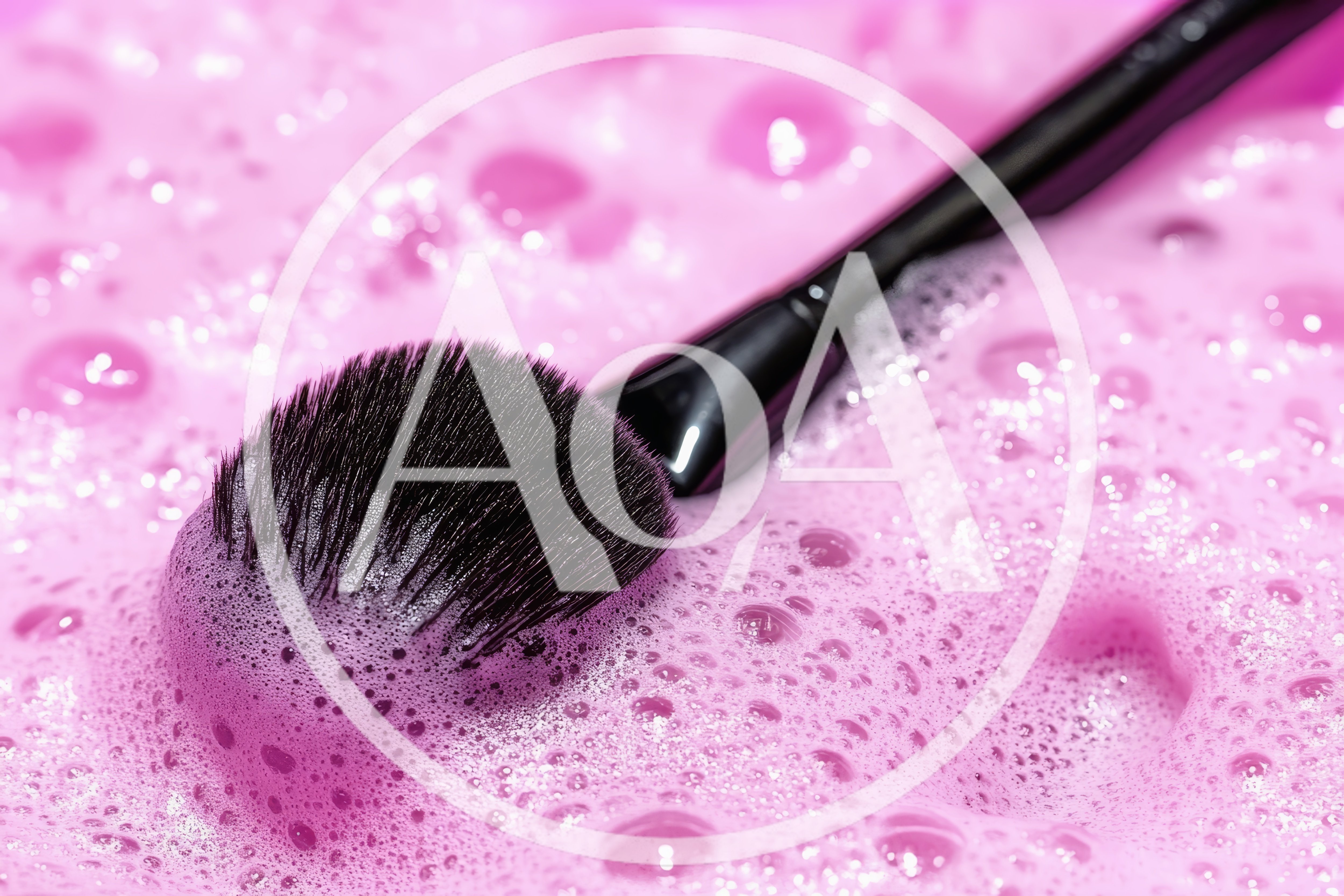Makeup Brush Cleaning In Pink Soap Suds