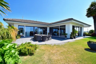 Modern House Exterior With Patio And Garden