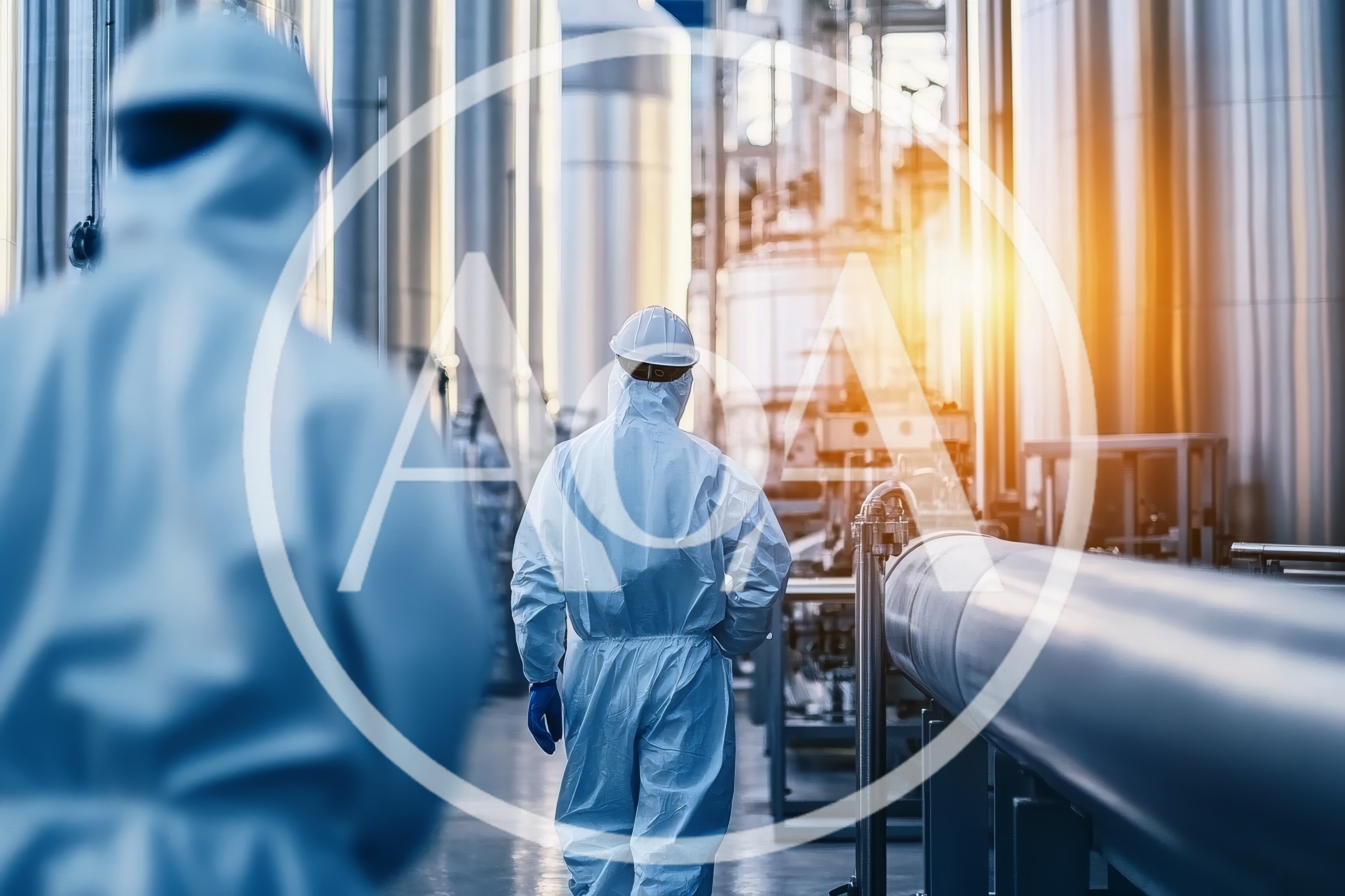 Industrial Workers in Protective Suits Walking Through Factory