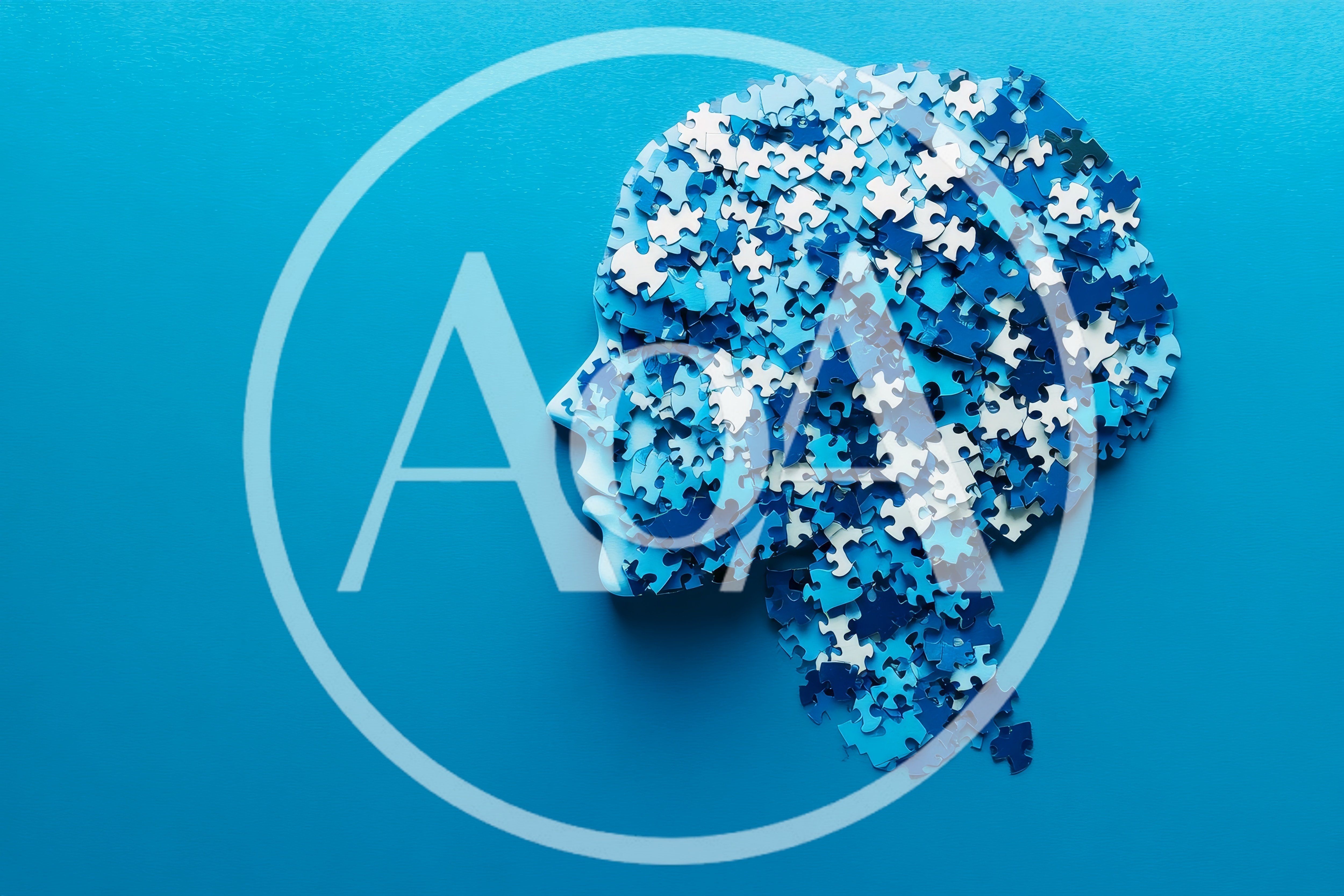 Human Head Silhouette Made Of Blue Jigsaw Puzzle Pieces