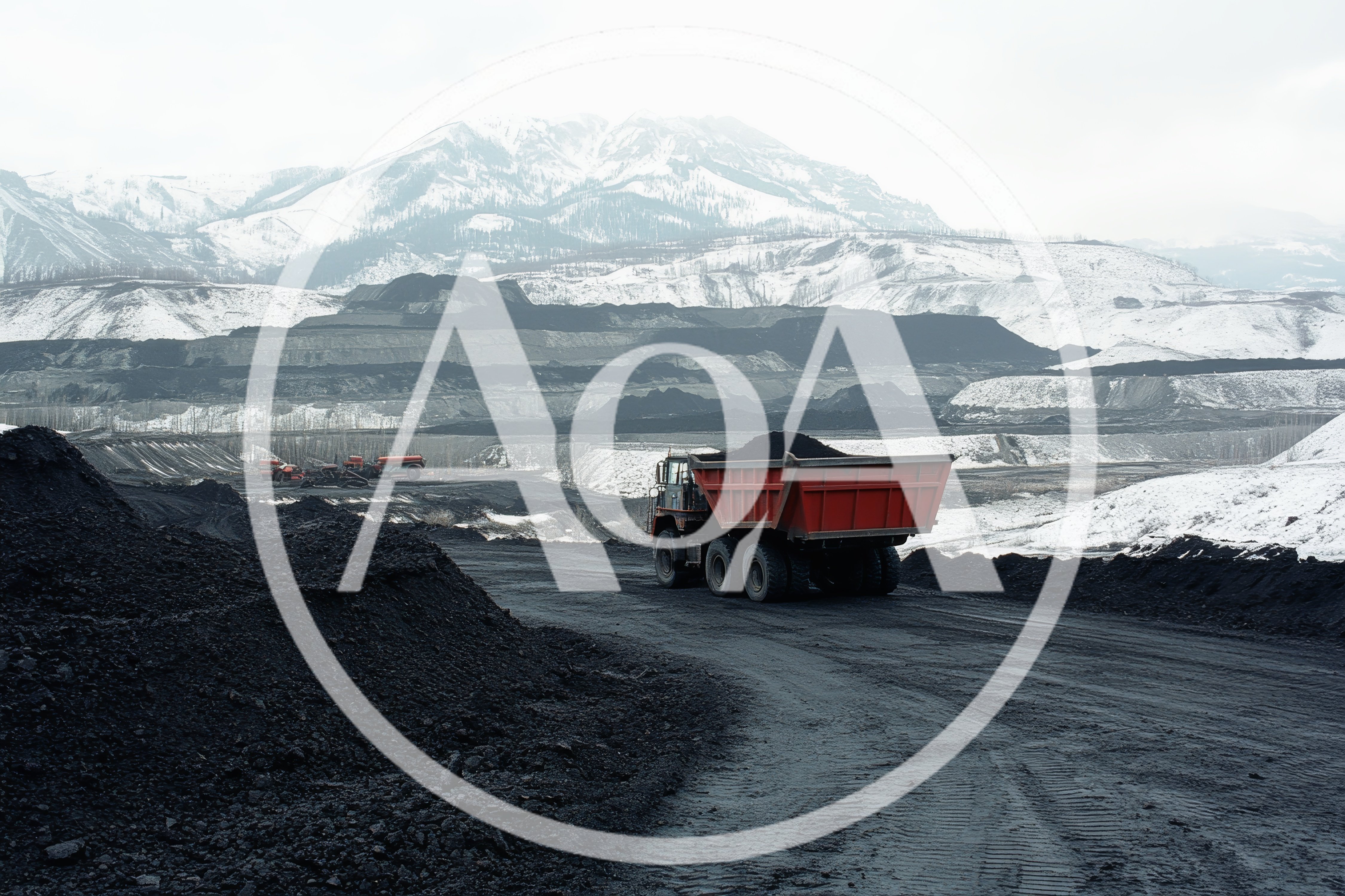 Heavy Duty Mining Truck Hauling Coal In Snowy Landscape