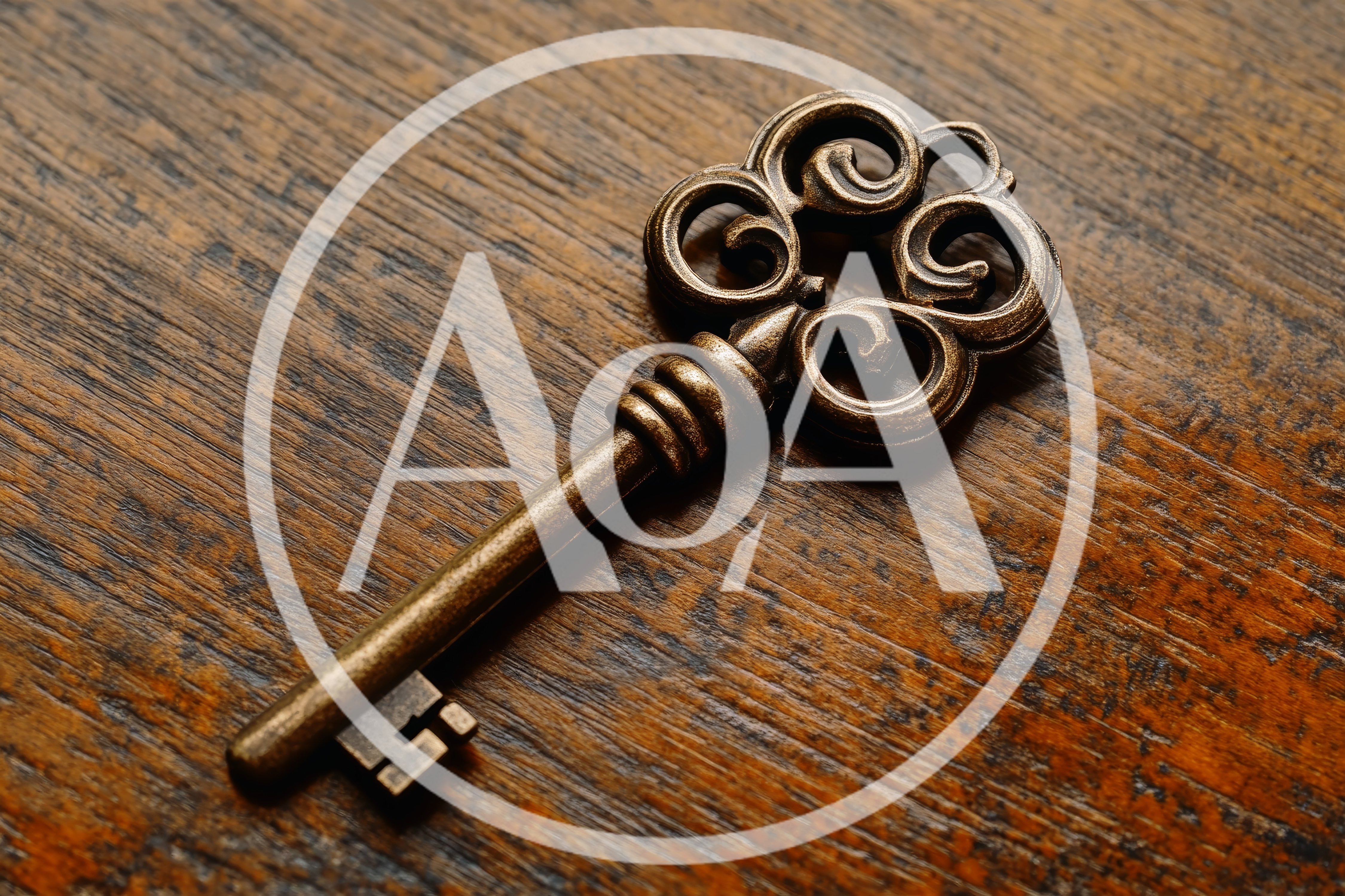 Antique Skeleton Key Resting On Dark Wooden Surface
