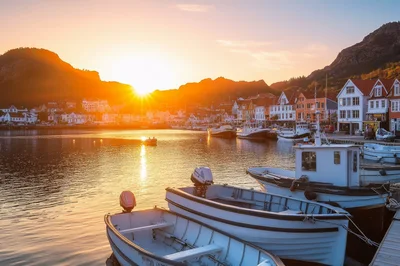 Fishing Boats Docked In A Norwegian Harbor At Sunset