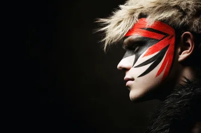 Profile Portrait Of A Man With Tribal Face Paint