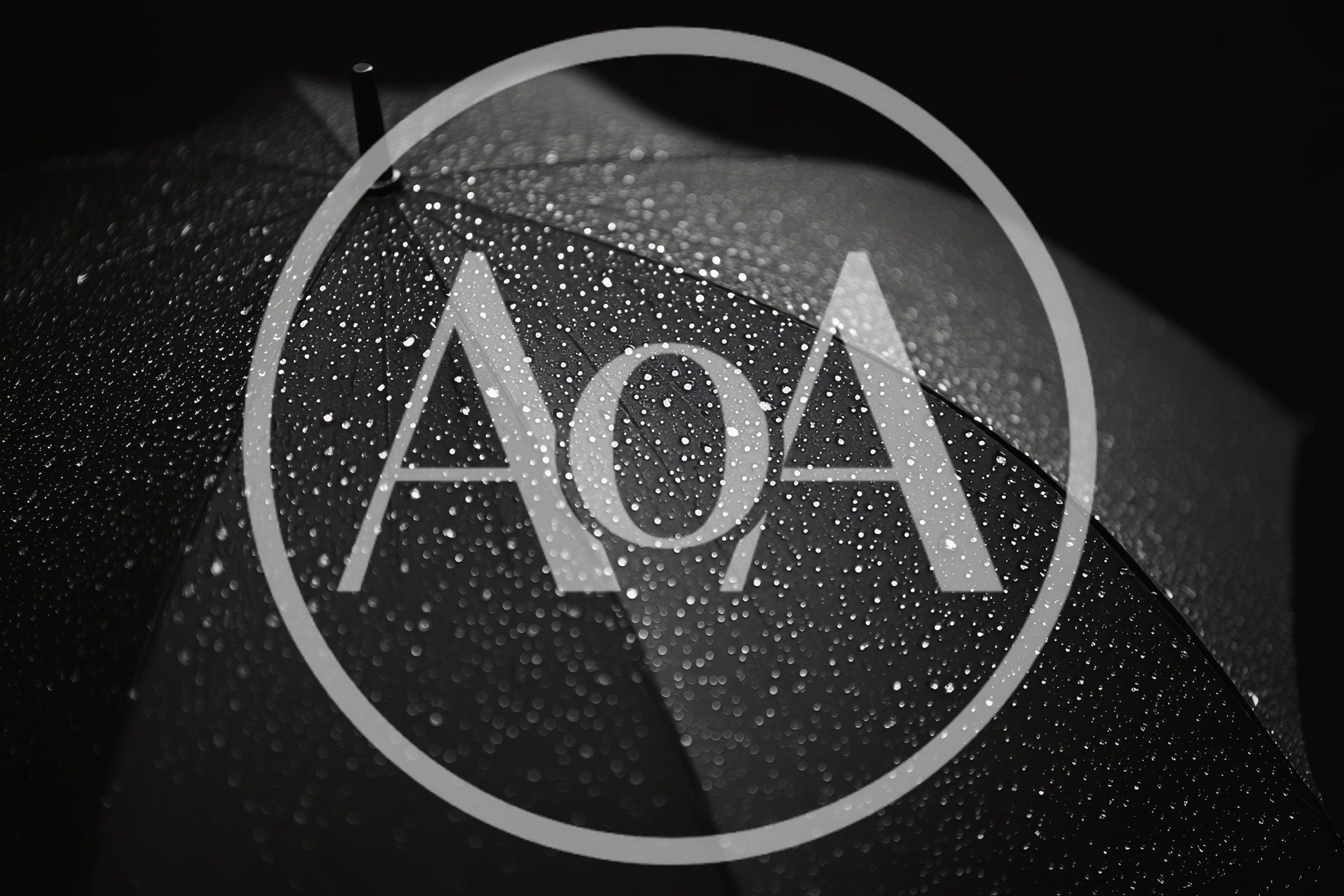 Raindrops On A Black Umbrella Surface