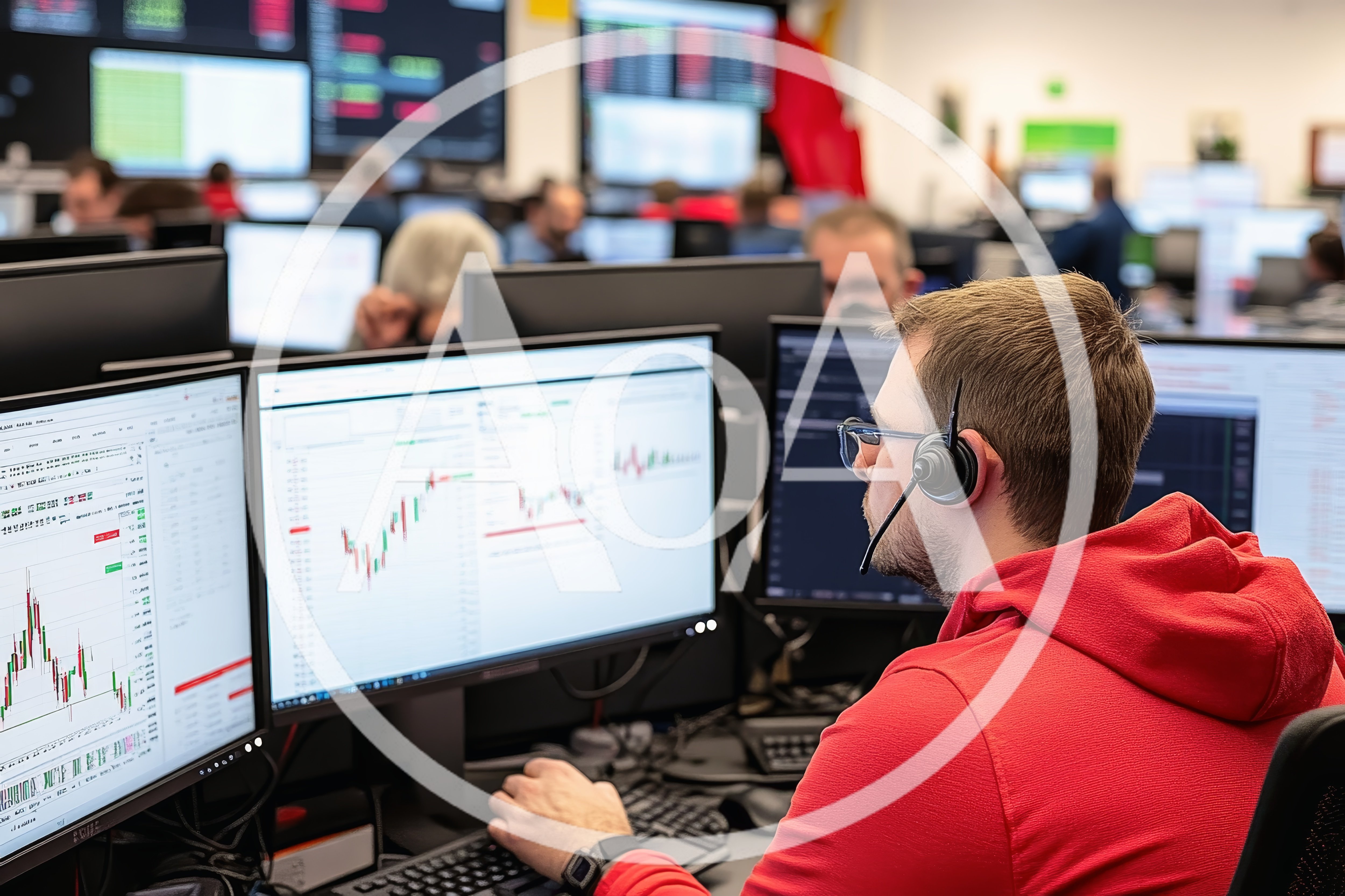 Financial Trader Working At Multiple Computer Monitors