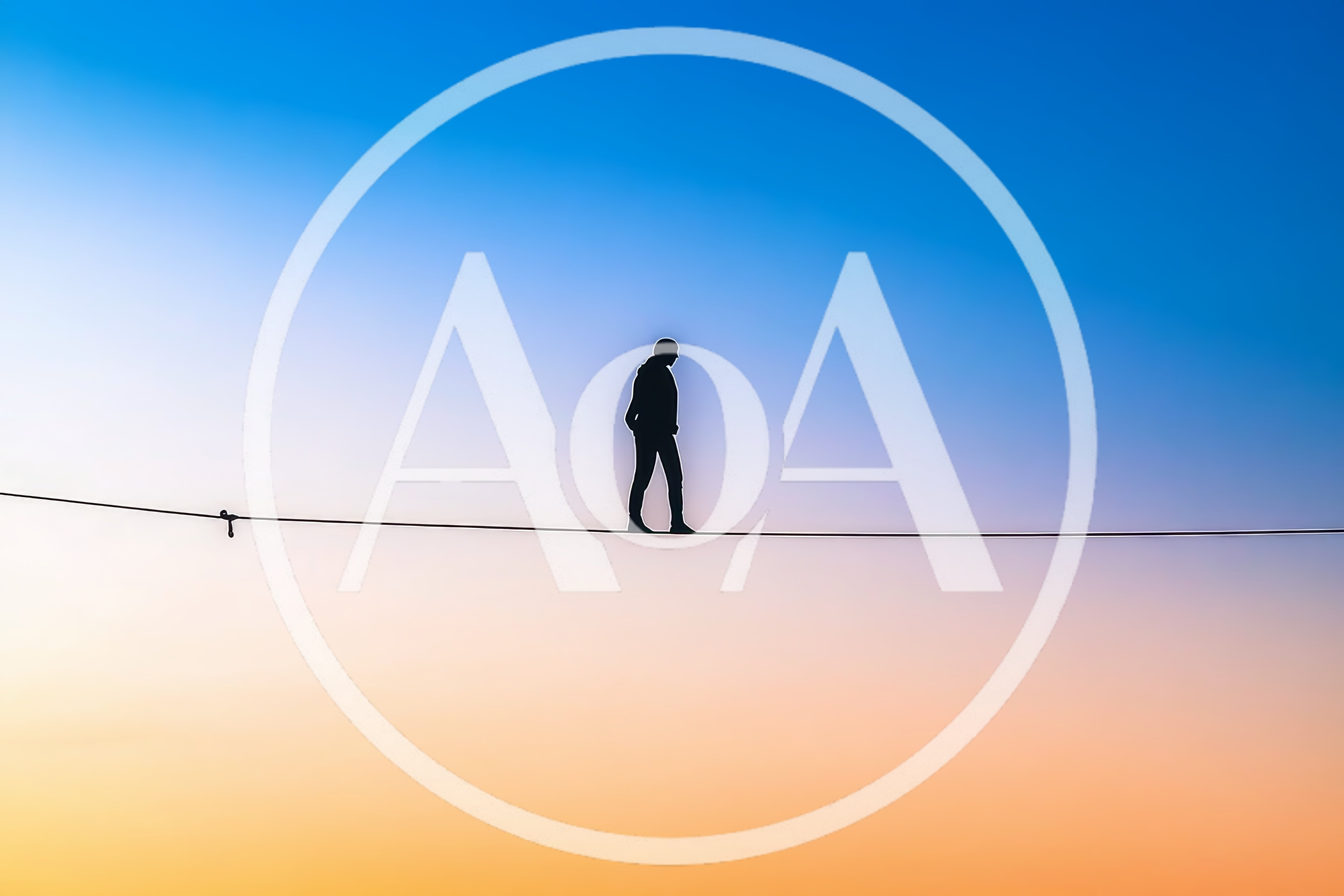 Silhouette Of A Tightrope Walker Against A Sunset Sky