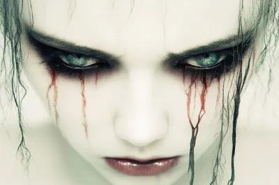 Close Up Portrait Of A Woman With Gothic Makeup
