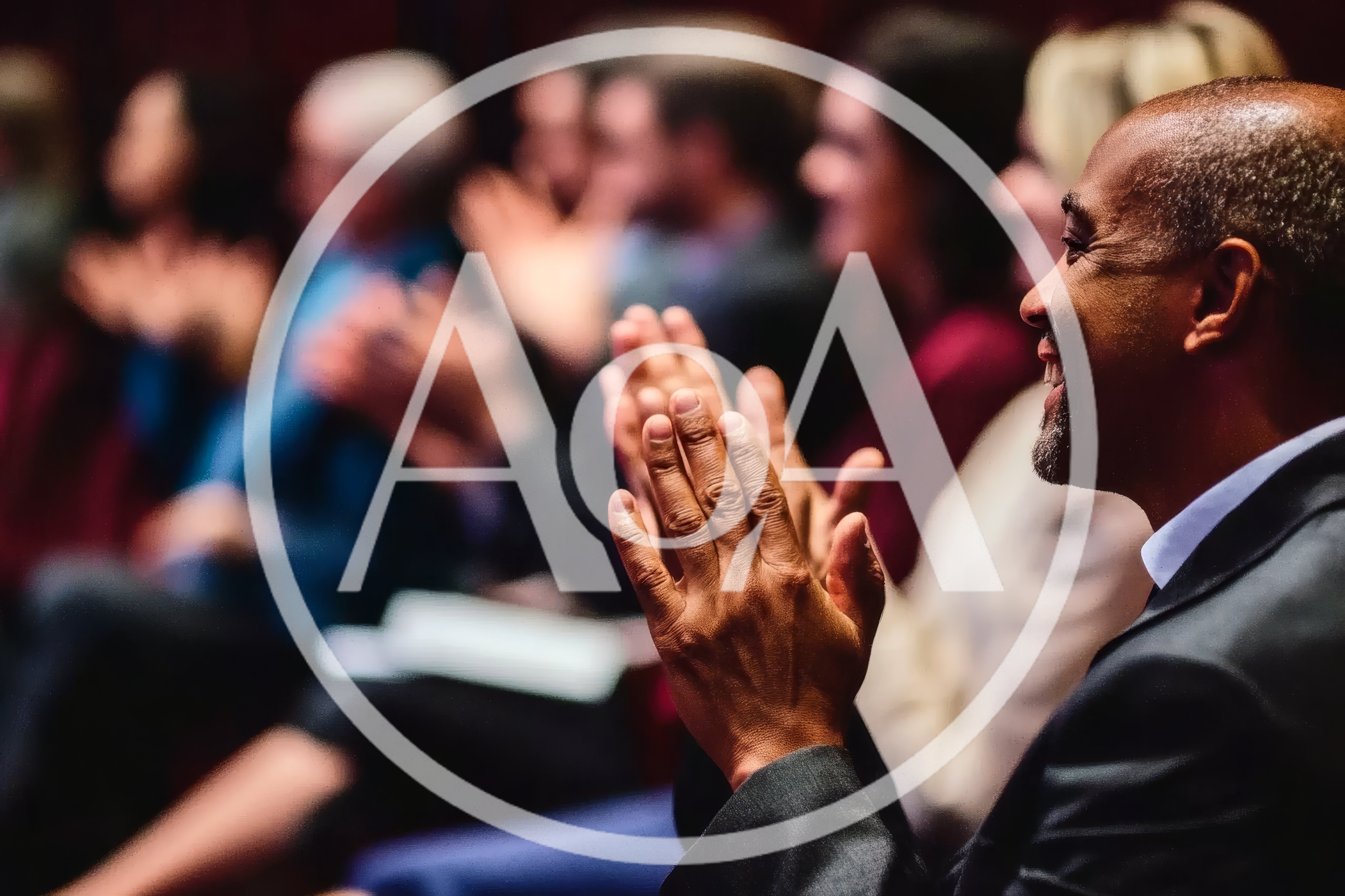 Diverse Audience Members Applauding During A Professional Conference