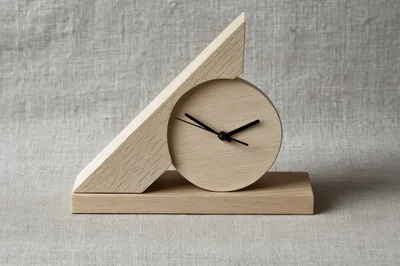 Minimalist Wooden Desk Clock On Textured Fabric Background