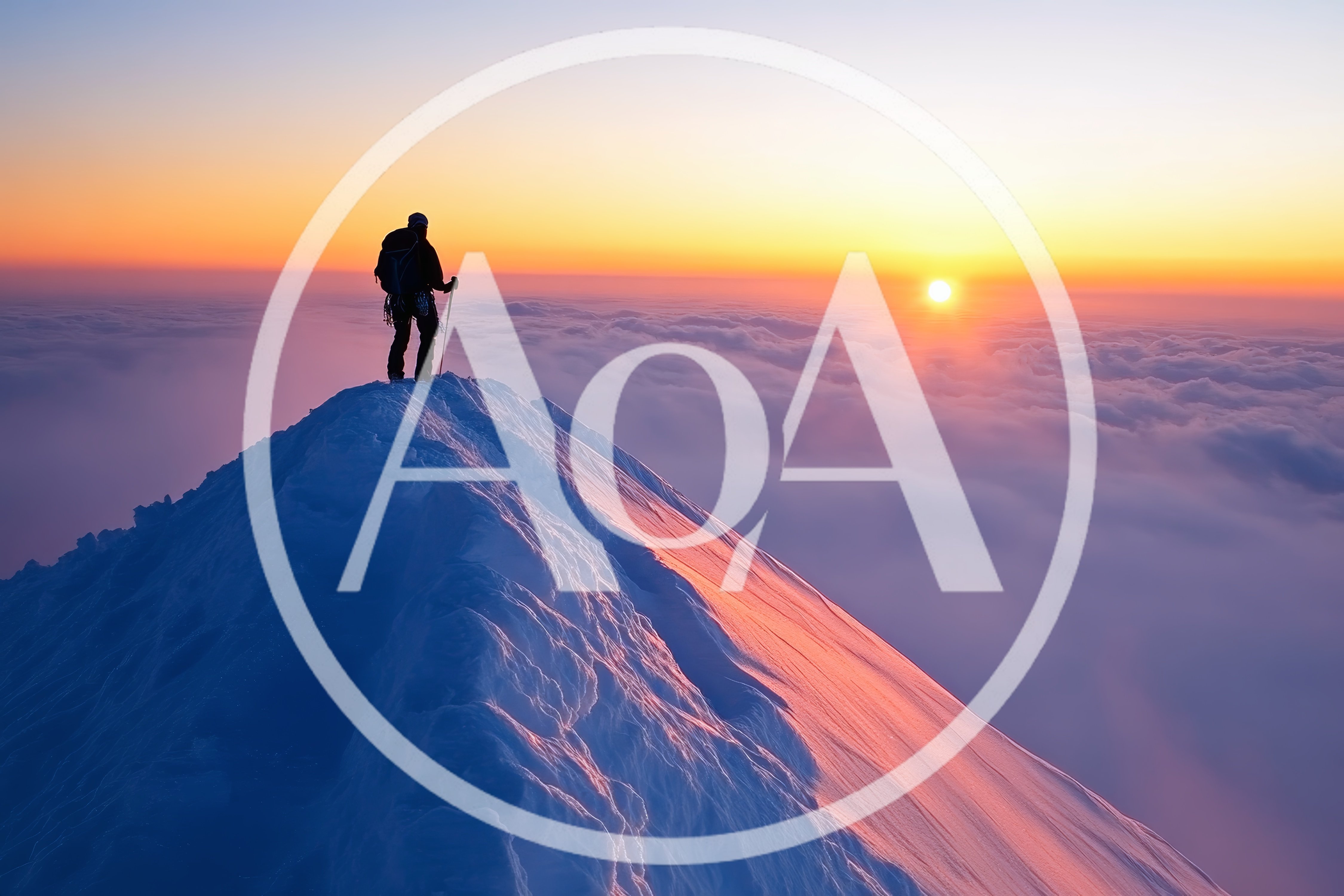 Mountaineer Standing On Snowy Mountain Peak At Sunrise