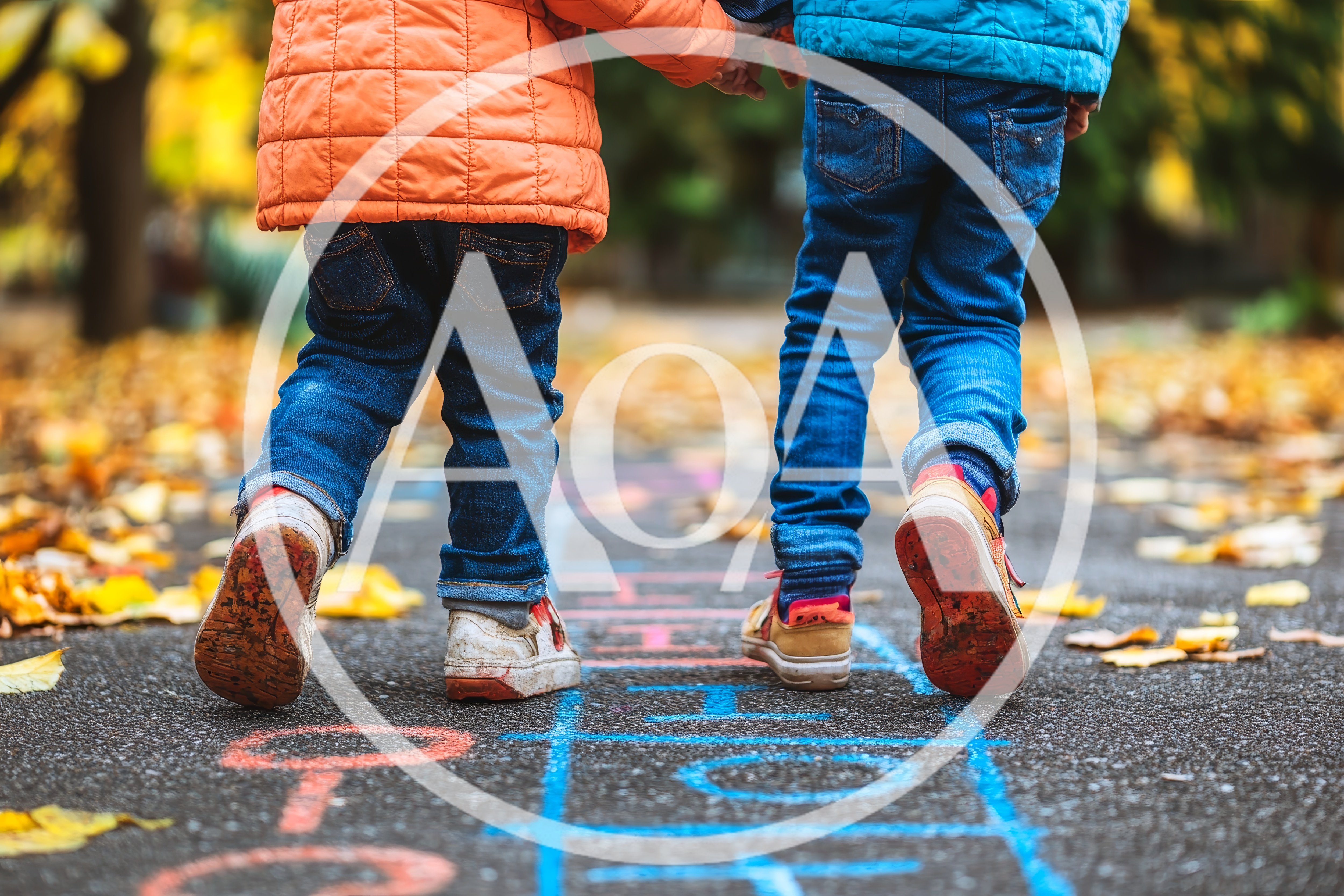 Two Children Playing Hopscotch on Autumn Path