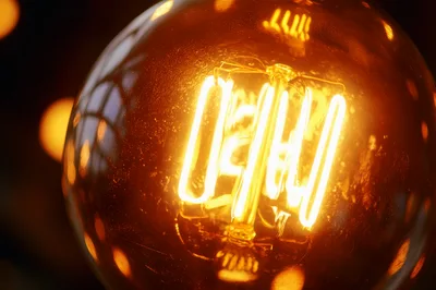 Close Up Of Glowing Vintage Edison Light Bulb