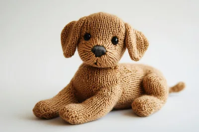 Knitted Brown Toy Dog On White Background