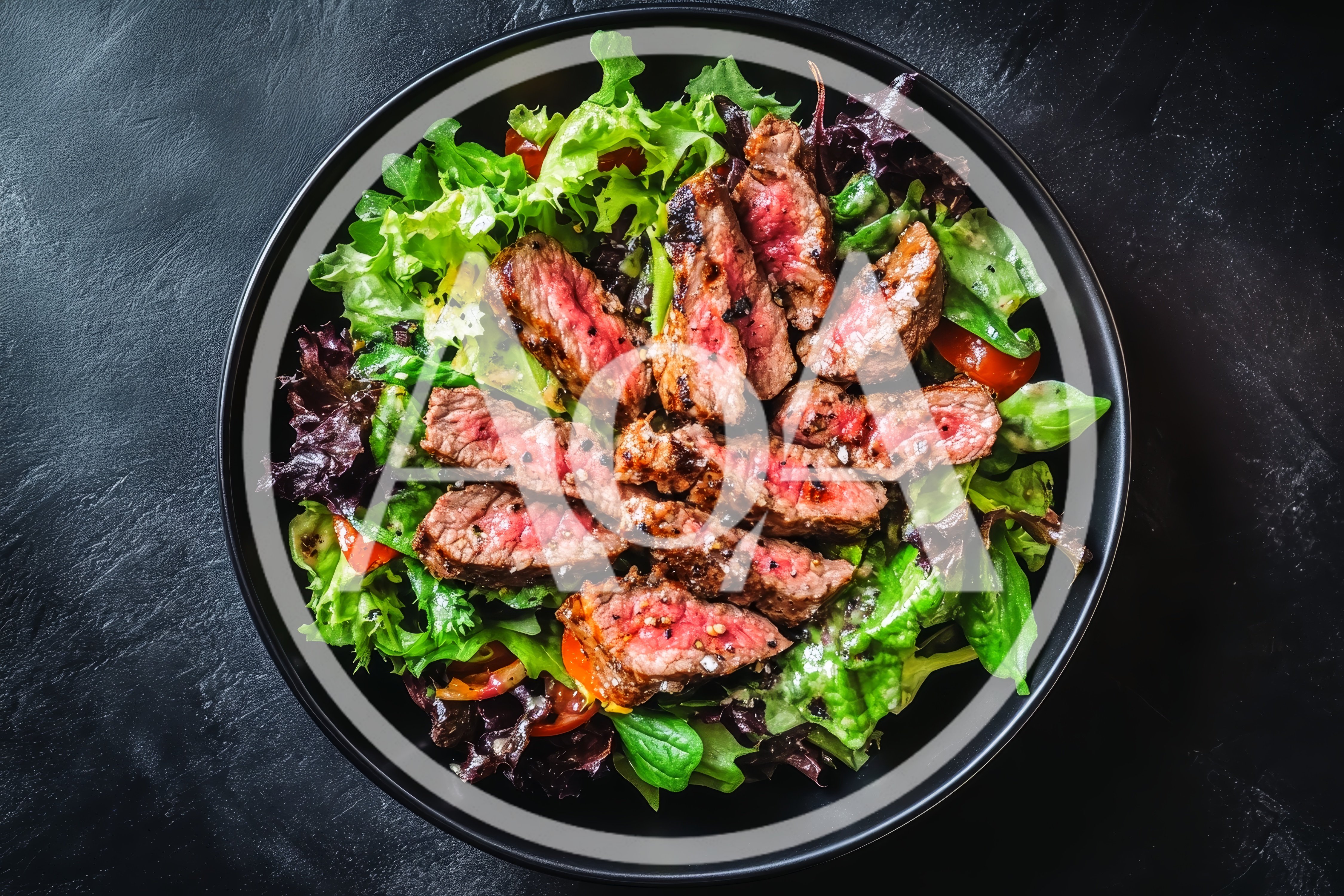 Grilled Steak Salad in a Black Bowl