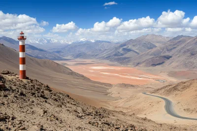 Red And White Lighthouse In The Andes Mountains