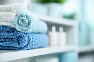 Stack Of Folded Blue And White Towels