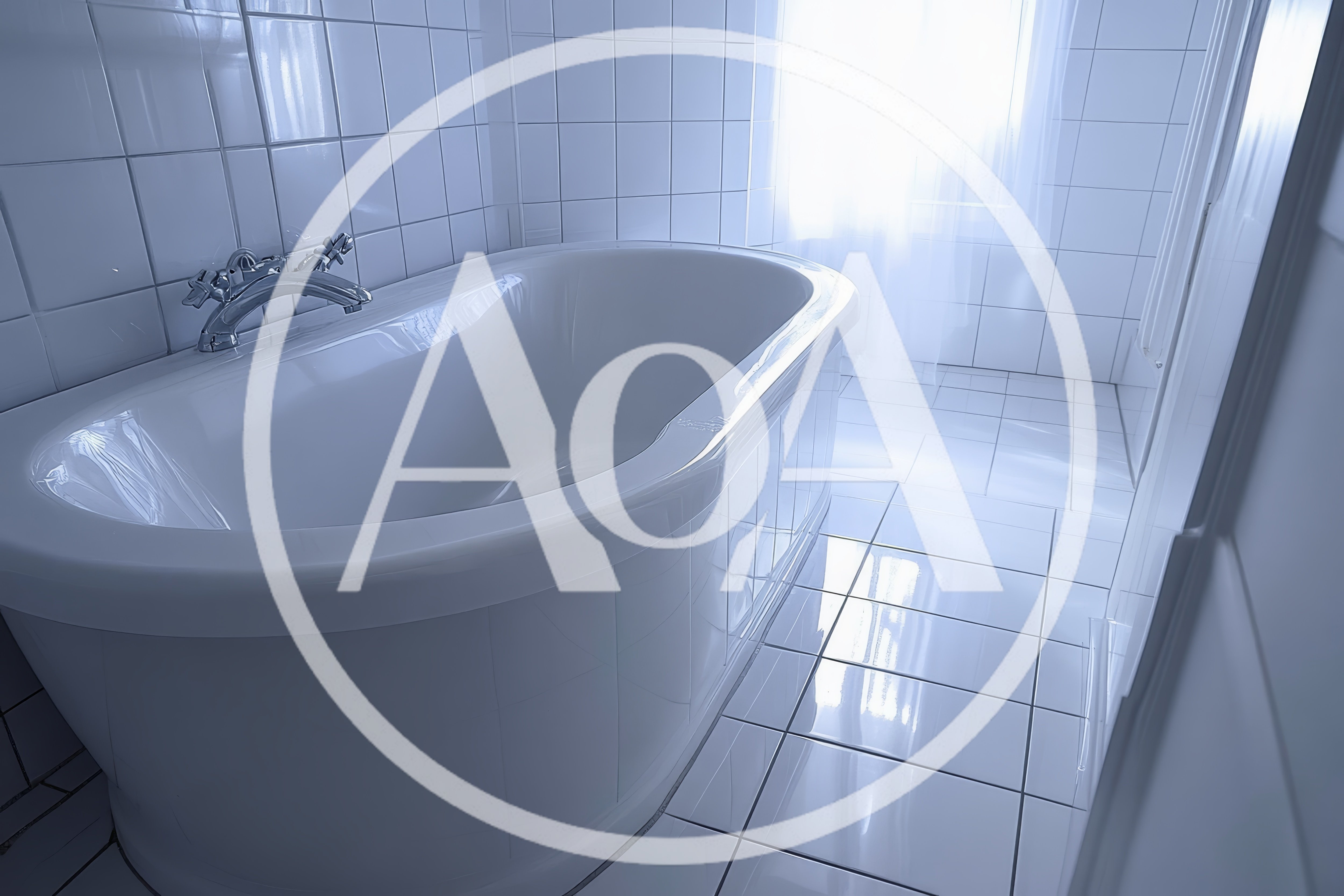 Modern White Bathtub In A Bright Tiled Bathroom