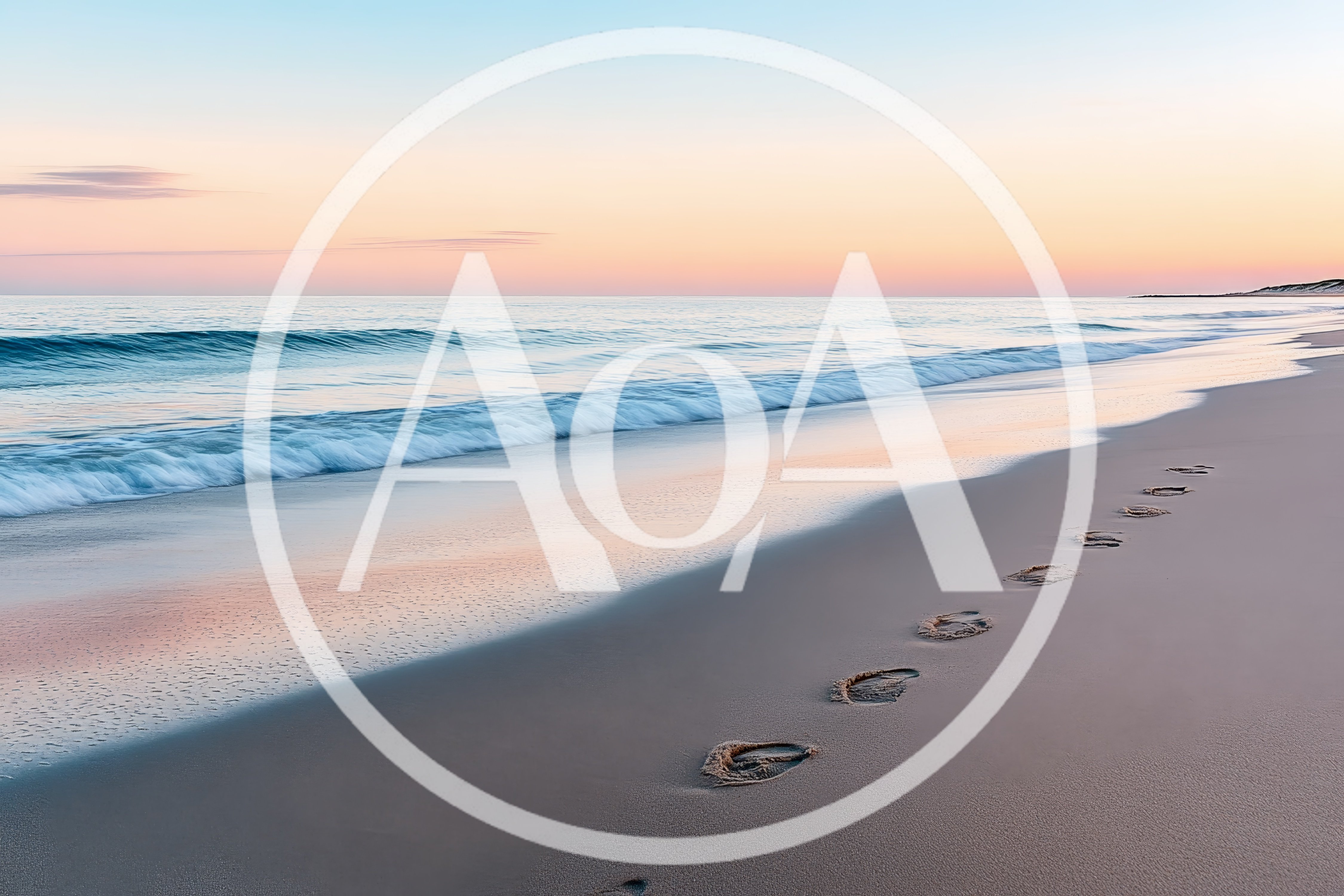 Footprints Leading Along A Serene Sandy Beach At Sunset