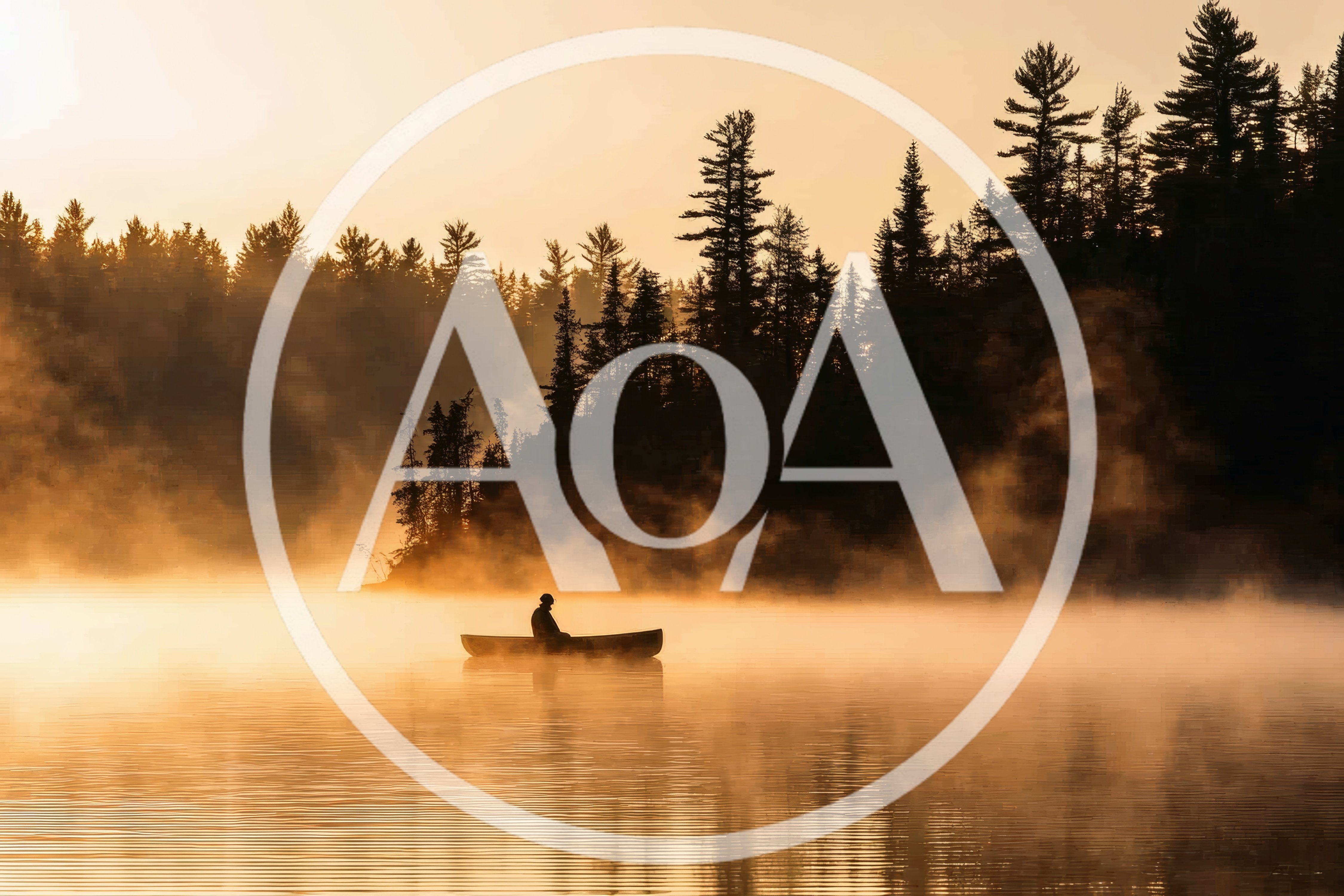 Lone Canoeist Paddling Through Morning Mist on Lake
