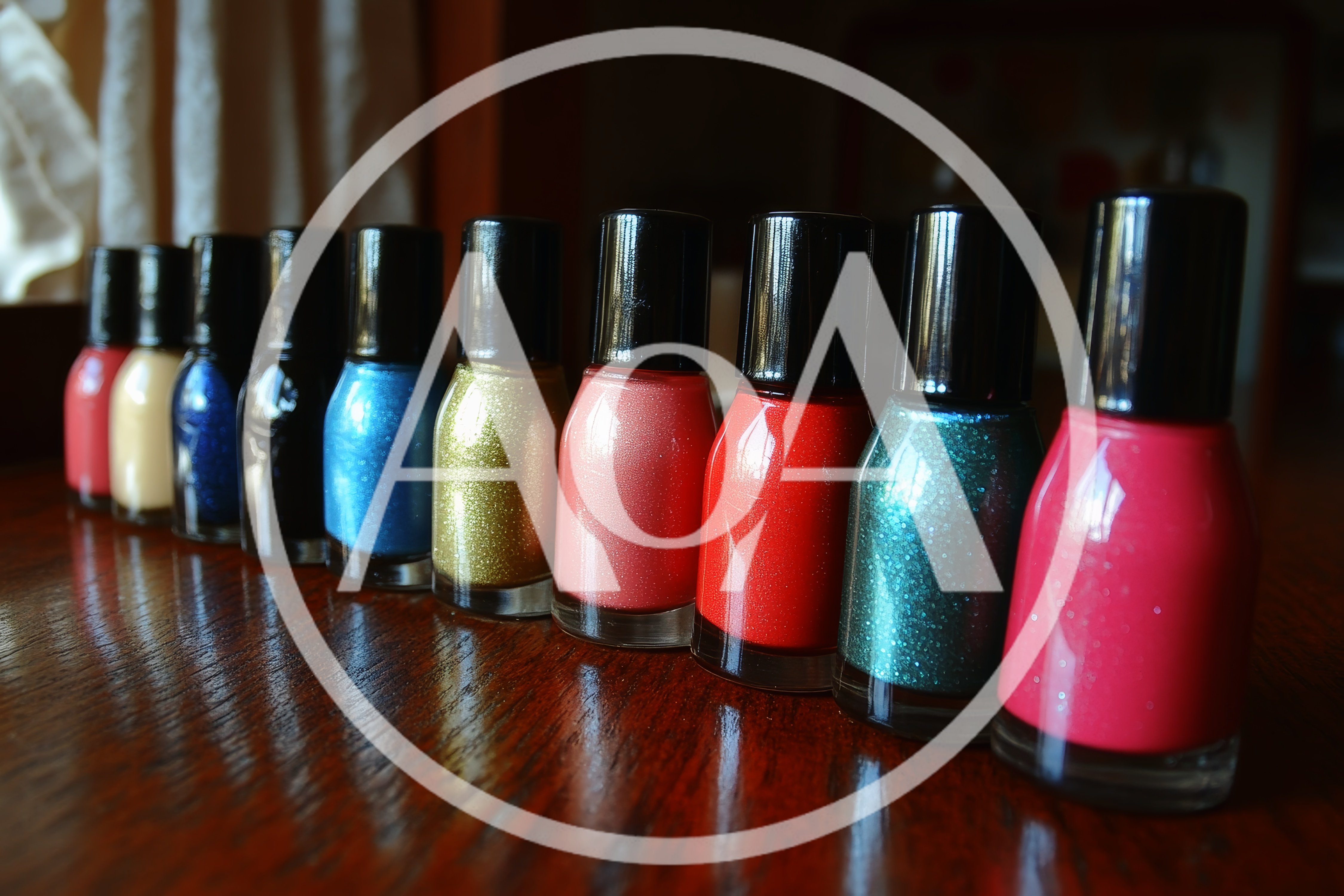 Row Of Colorful Nail Polish Bottles On Wooden Table