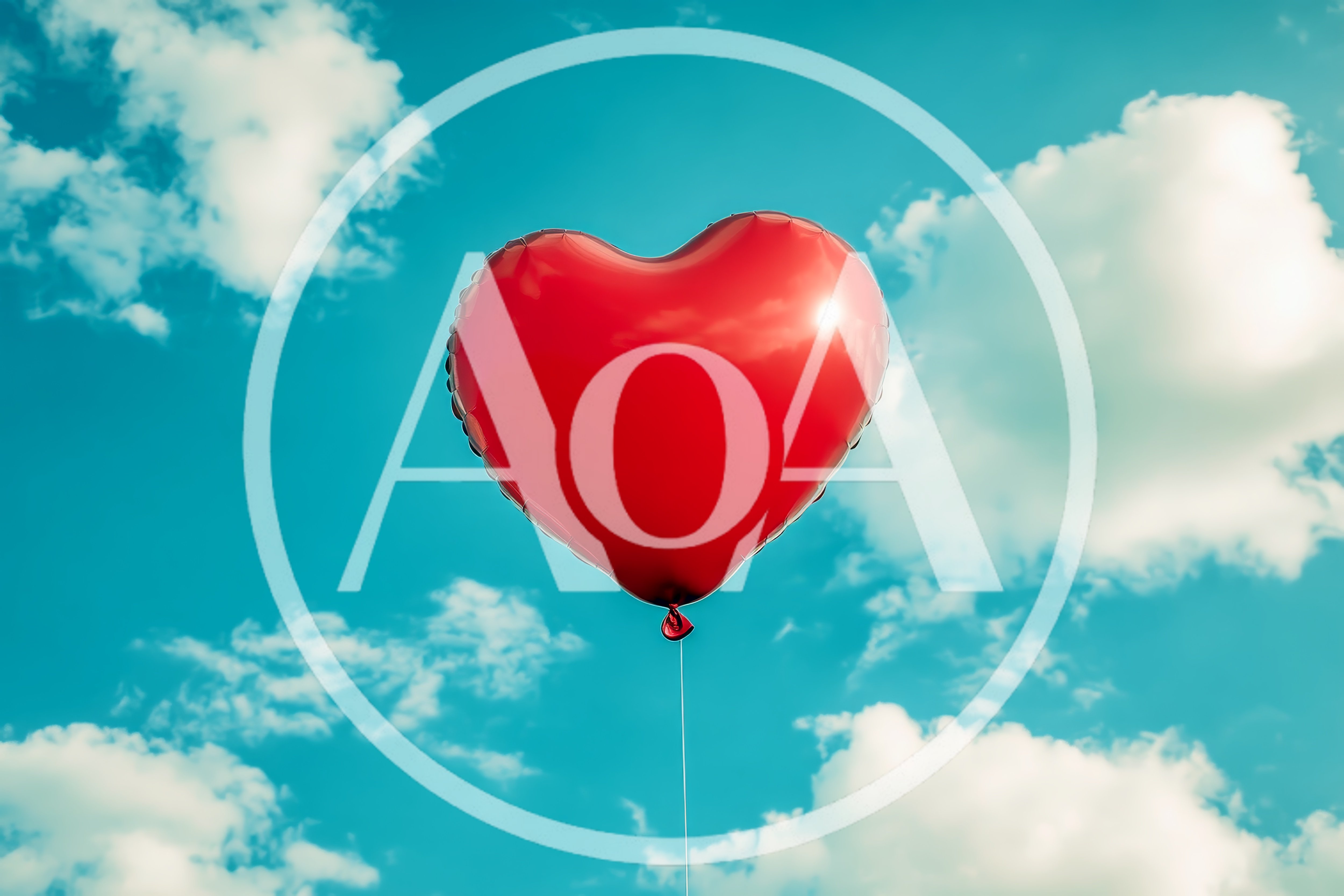 Red Heart Shaped Balloon Floating In Blue Sky