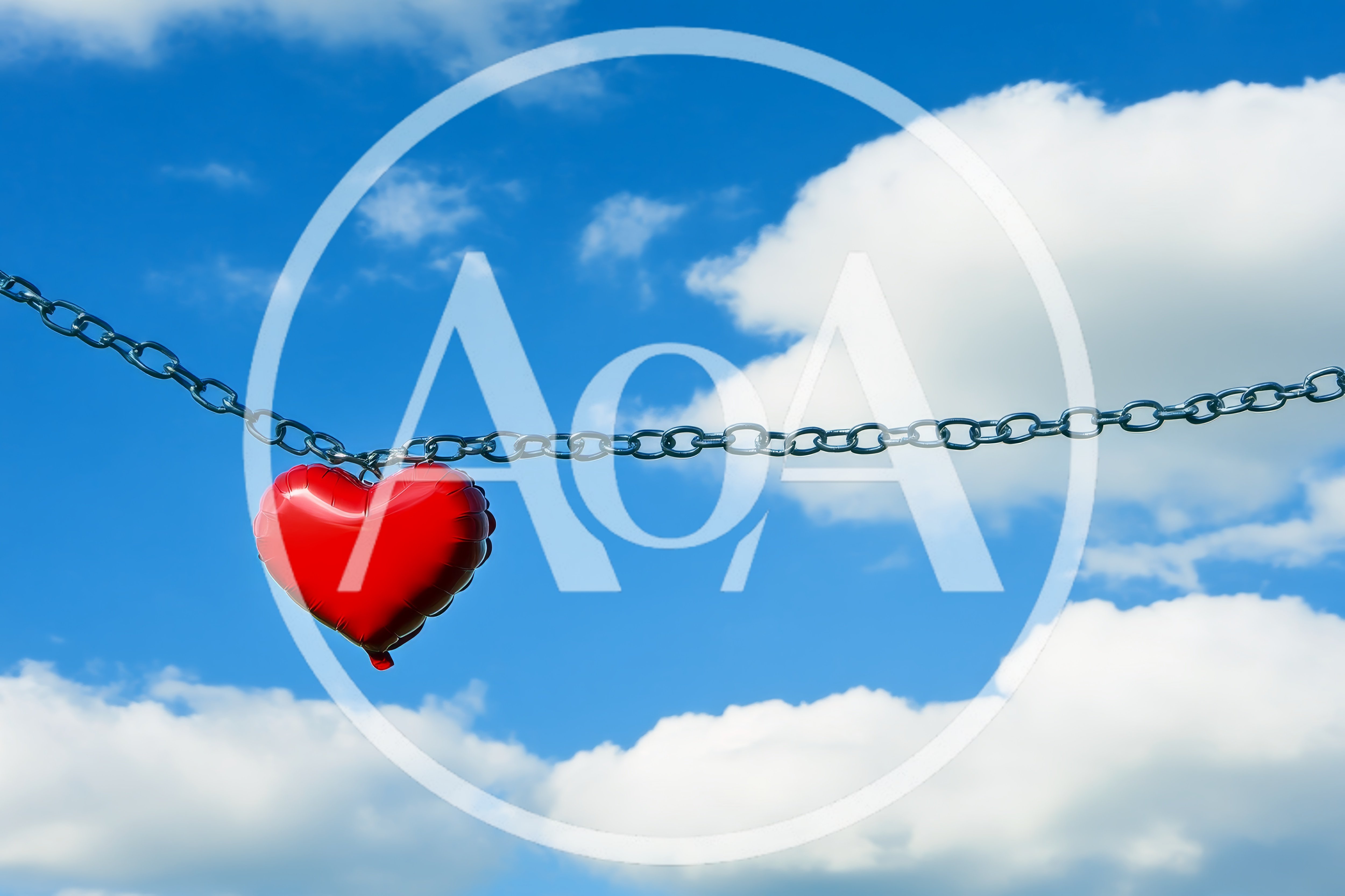 Red Heart Balloon Hanging From A Metal Chain