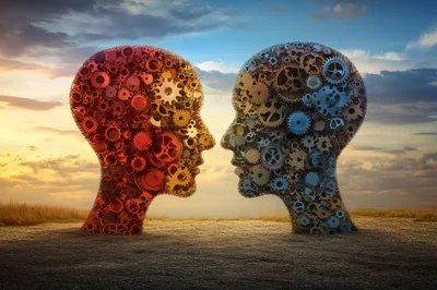 Two Human Head Silhouettes Made Of Interlocking Gears