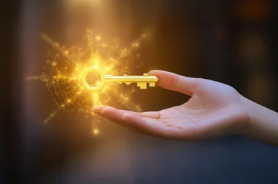 Hand Holding A Glowing Digital Golden Key