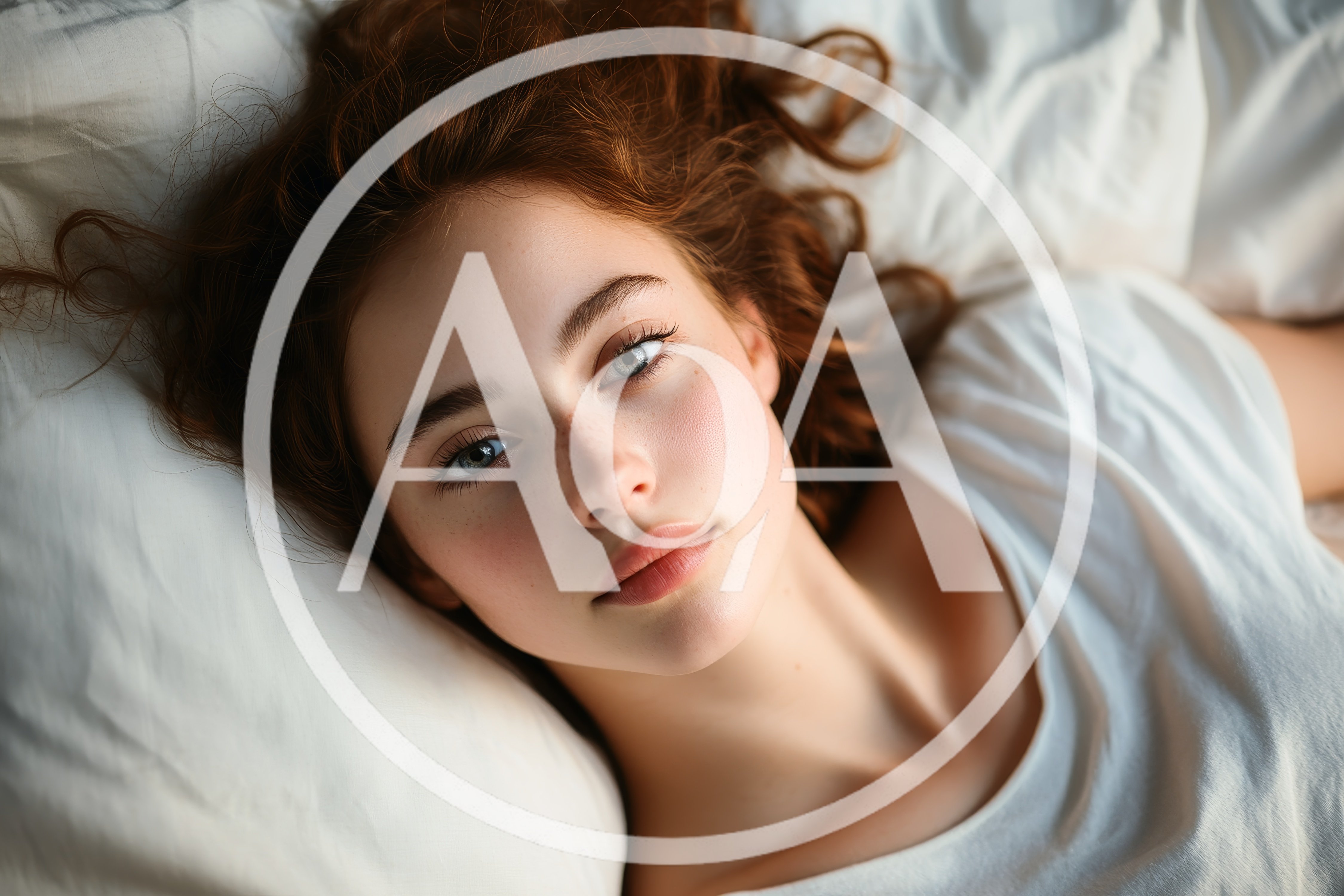 Young Woman With Red Hair Resting On White Bedding
