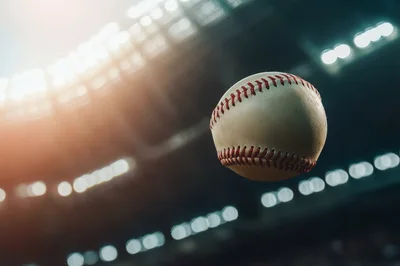 Baseball Flying Through The Air In A Stadium