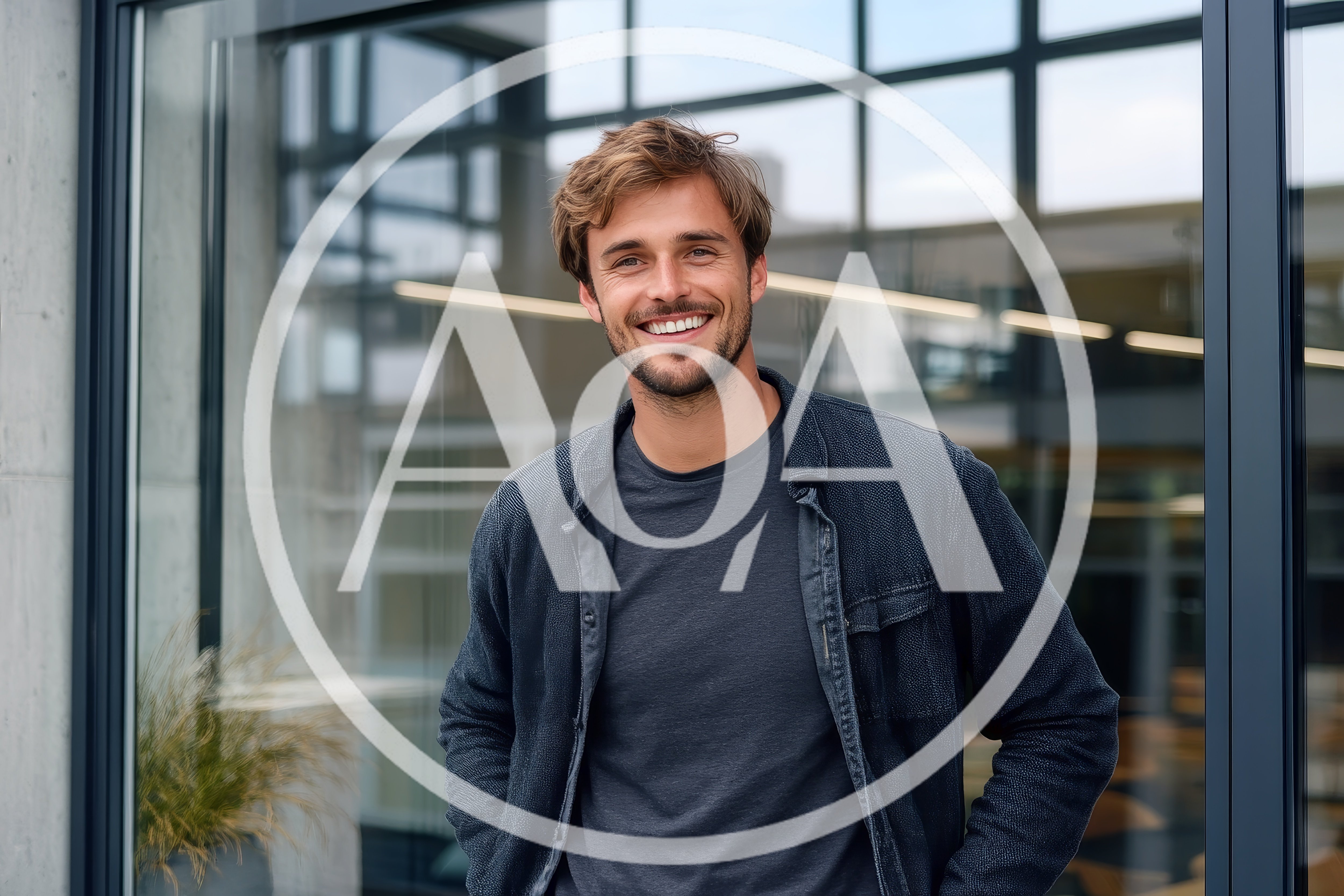 Smiling Young Man Standing Outside Modern Office Building