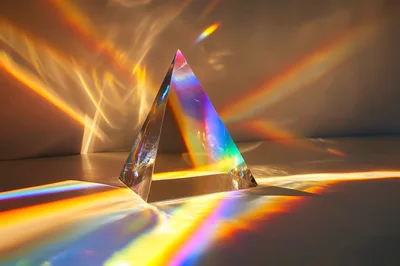 Glass Pyramid Prism Creating Rainbow Light Refractions