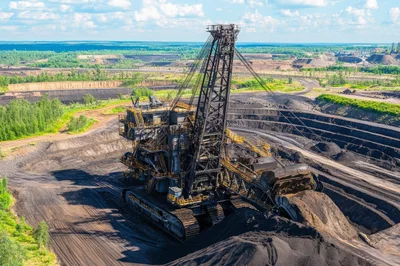 Large Walking Dragline Excavator Operating in Open Pit Mine