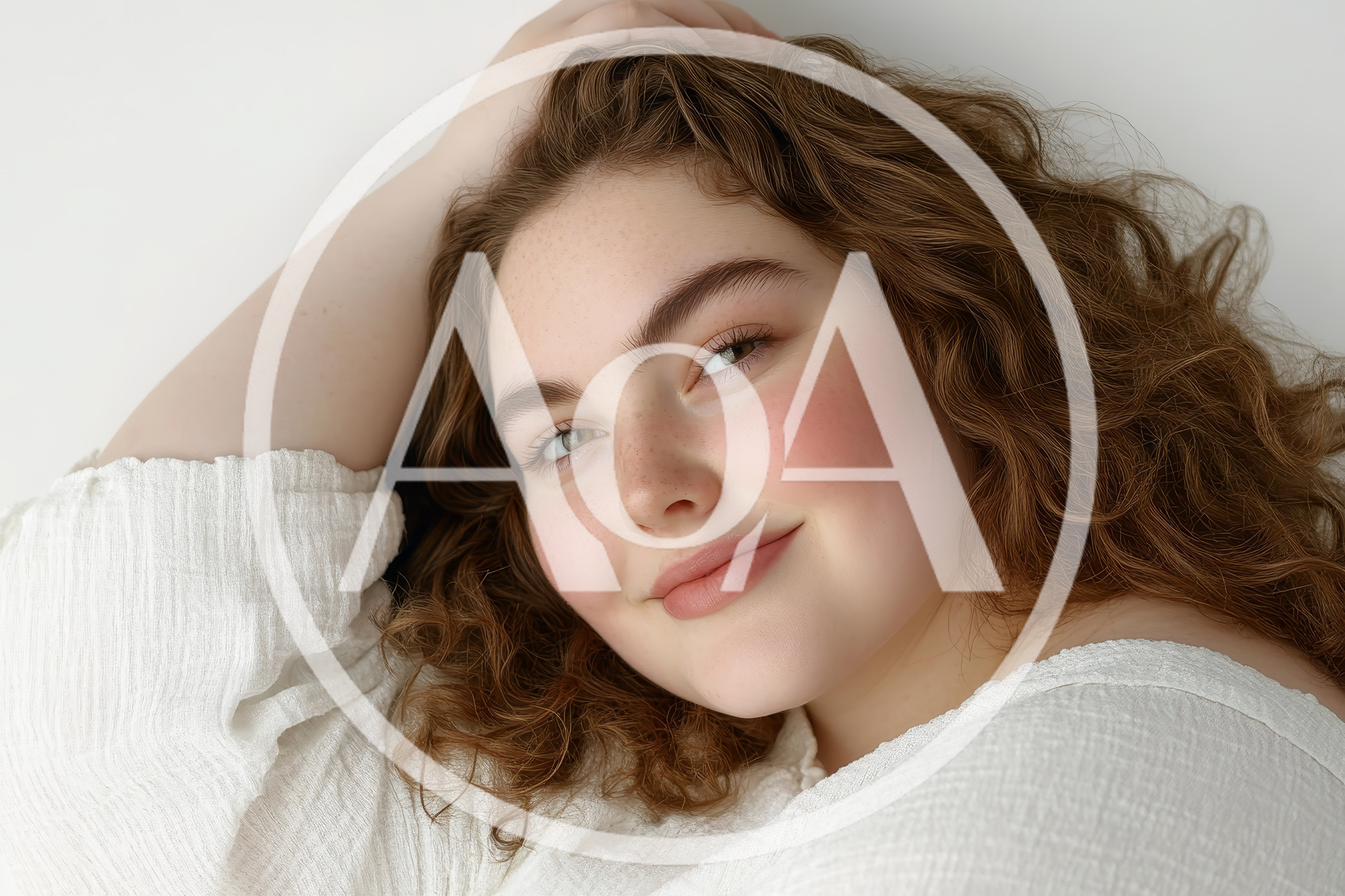 Portrait Of A Young Woman With Curly Hair