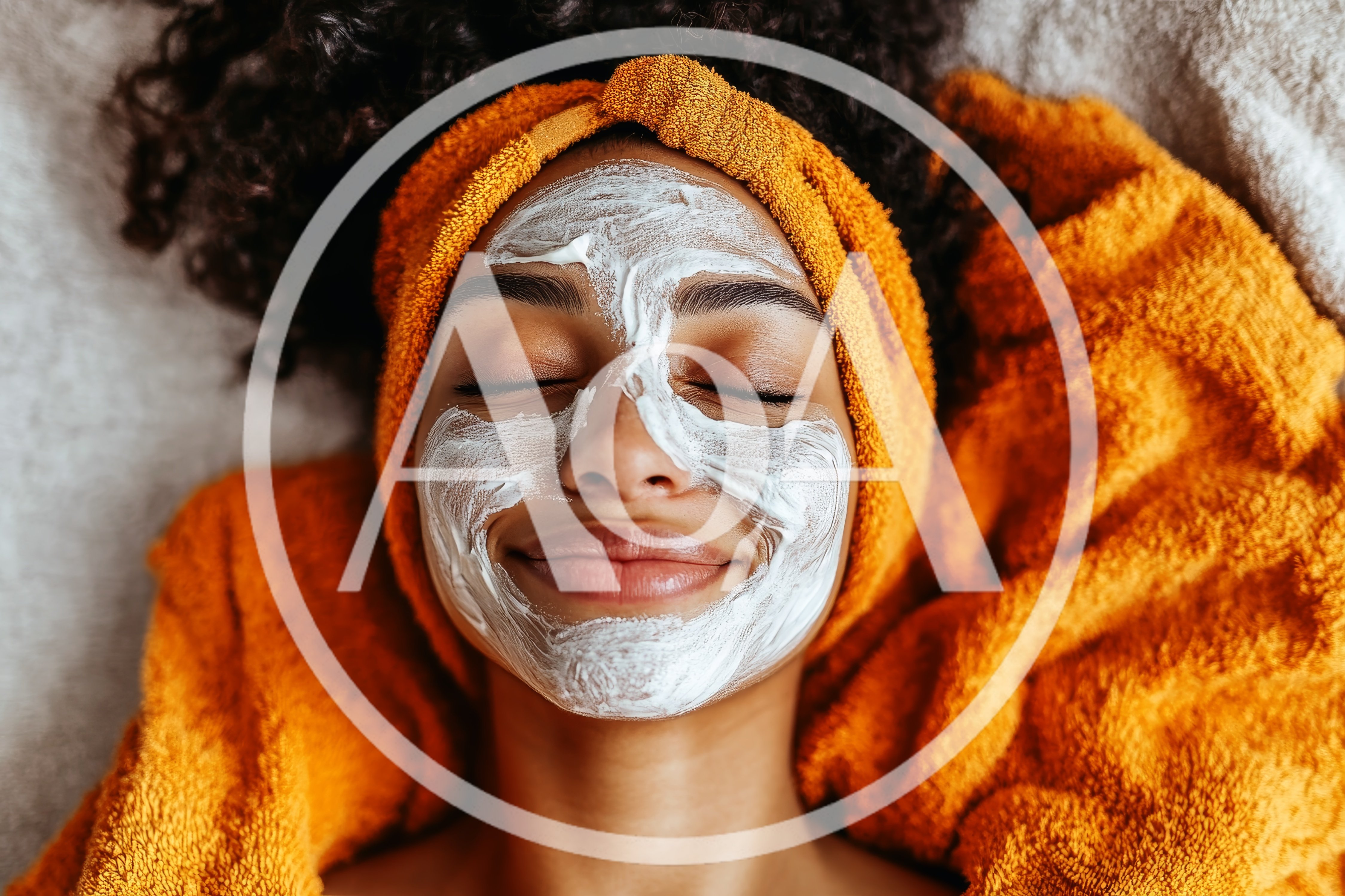 Young Woman Relaxing With A Facial Mask