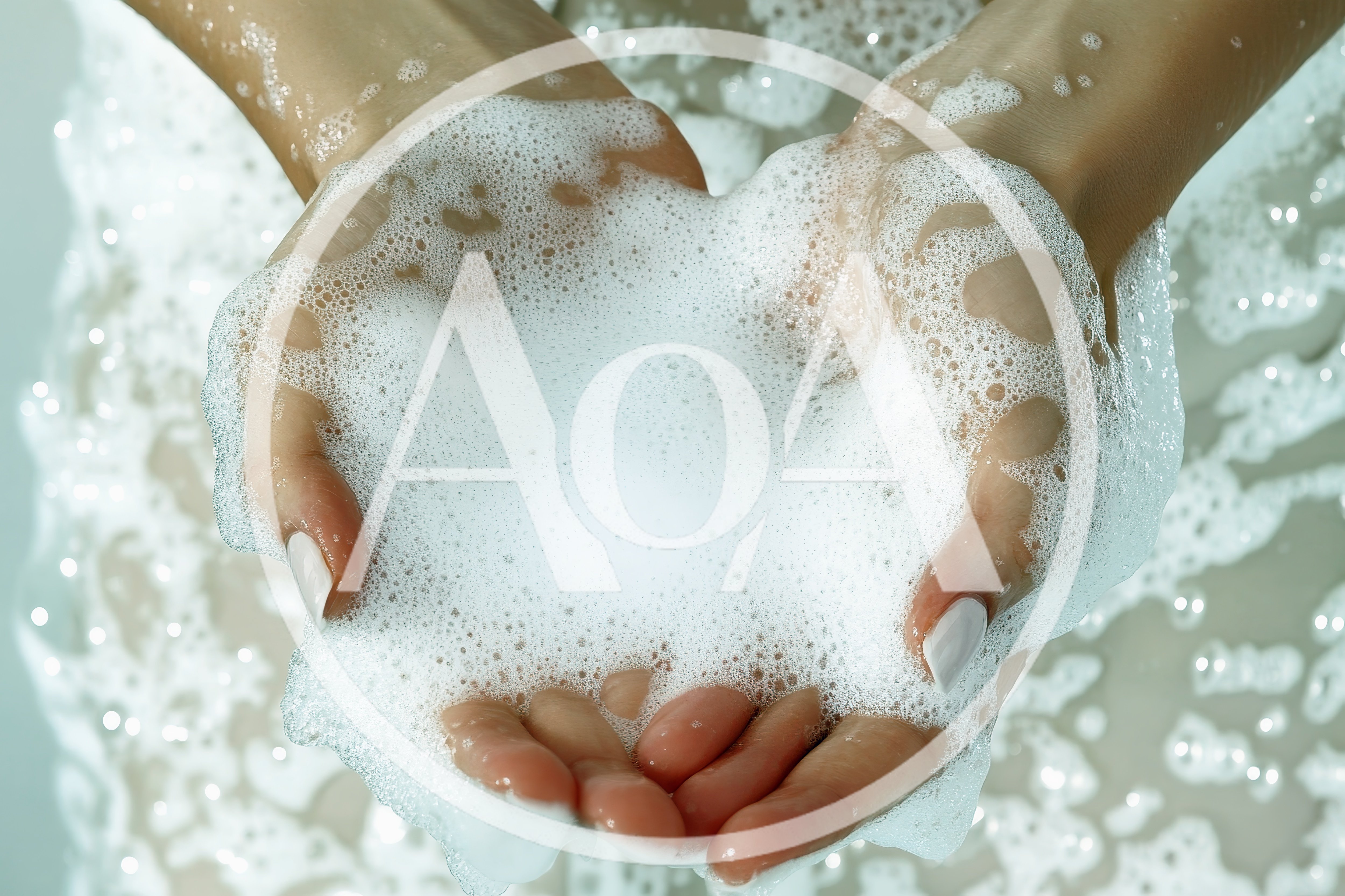 Woman Holding Soapy Foam In Cupped Hands