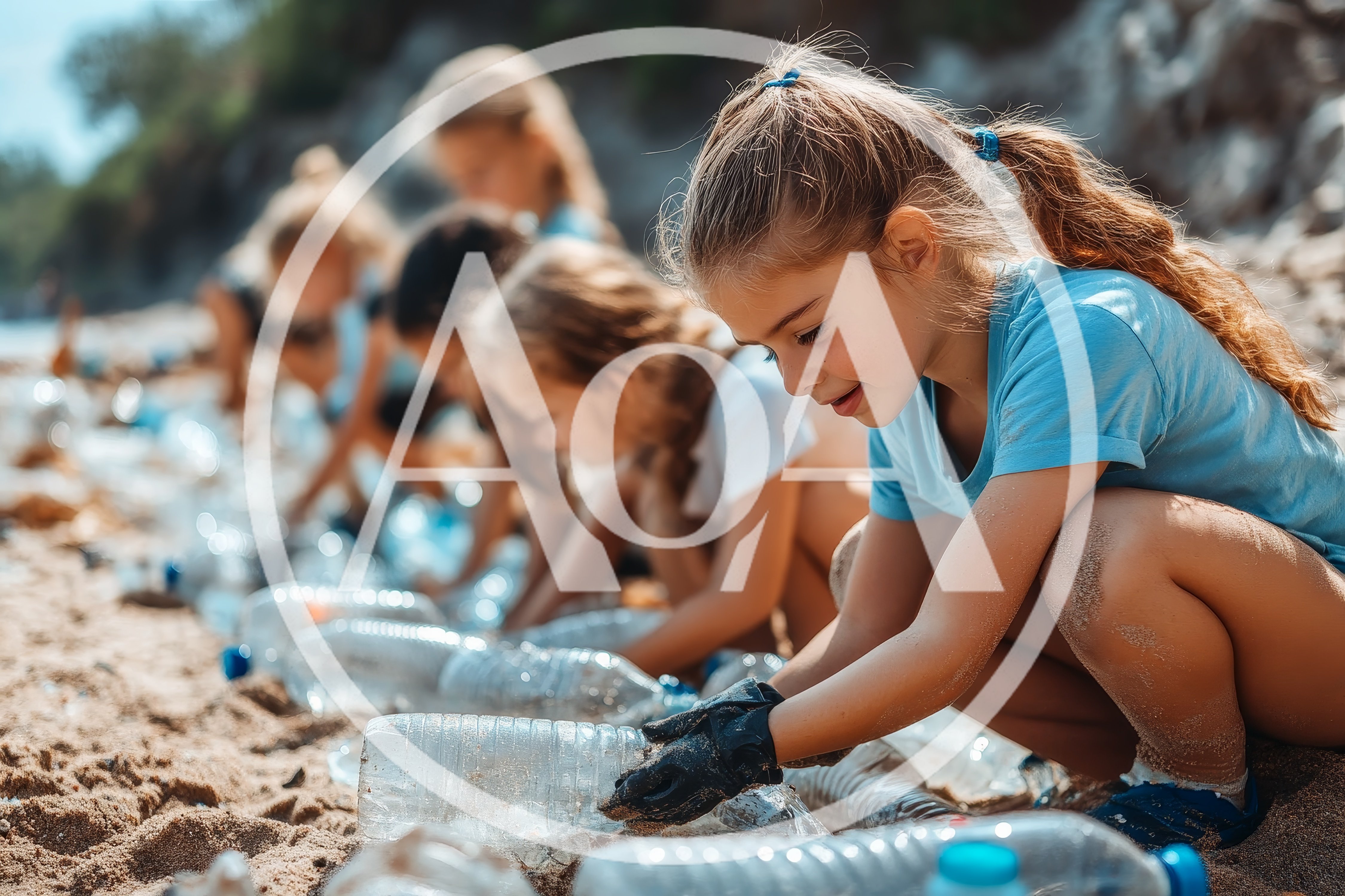 Children Cleaning Plastic Bottles From A Sandy Beach