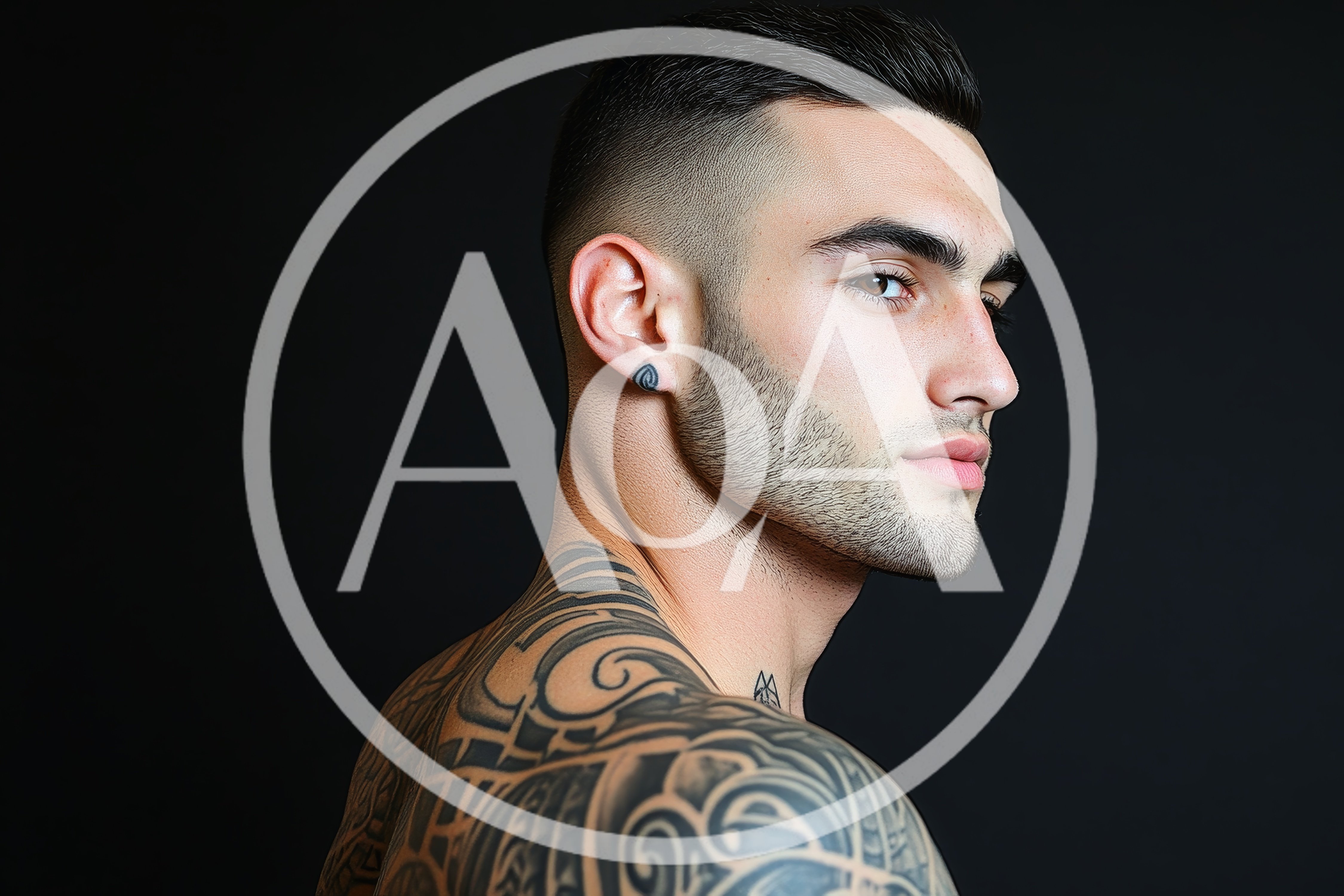 Portrait Of A Young Man With Tribal Tattoos