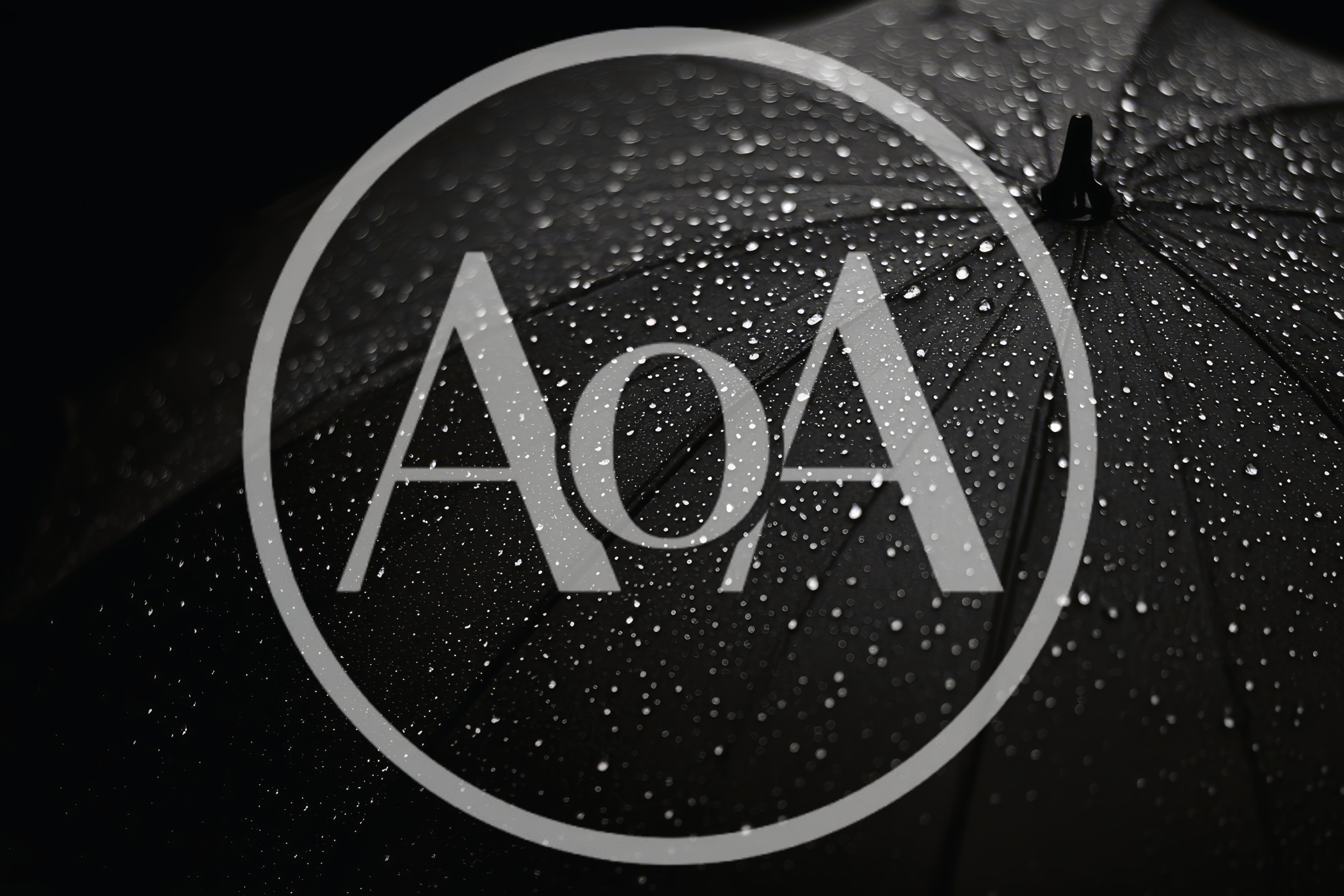 Raindrops On A Black Umbrella Surface