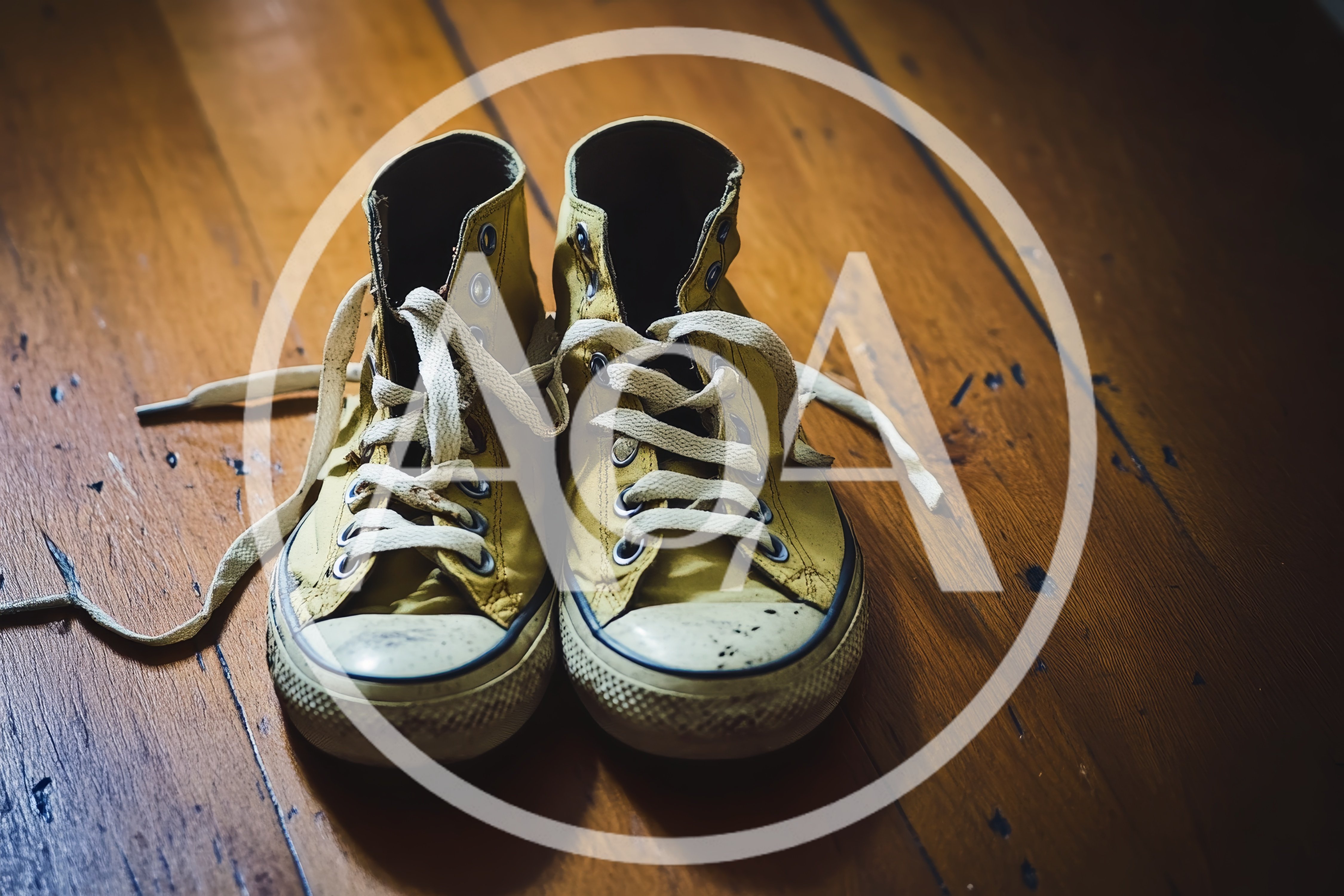 Pair Of Worn Yellow High Top Sneakers