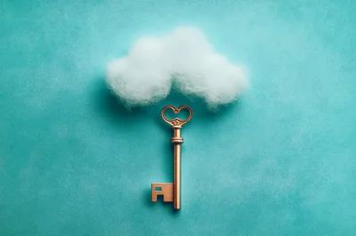 Vintage Metal Key Under A Fluffy White Cloud