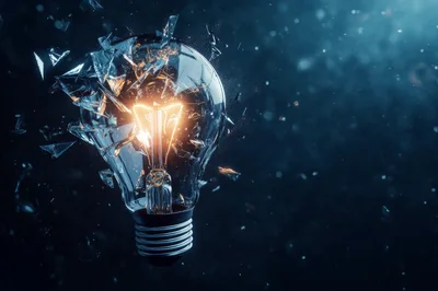 Shattering Light Bulb With Glowing Filament